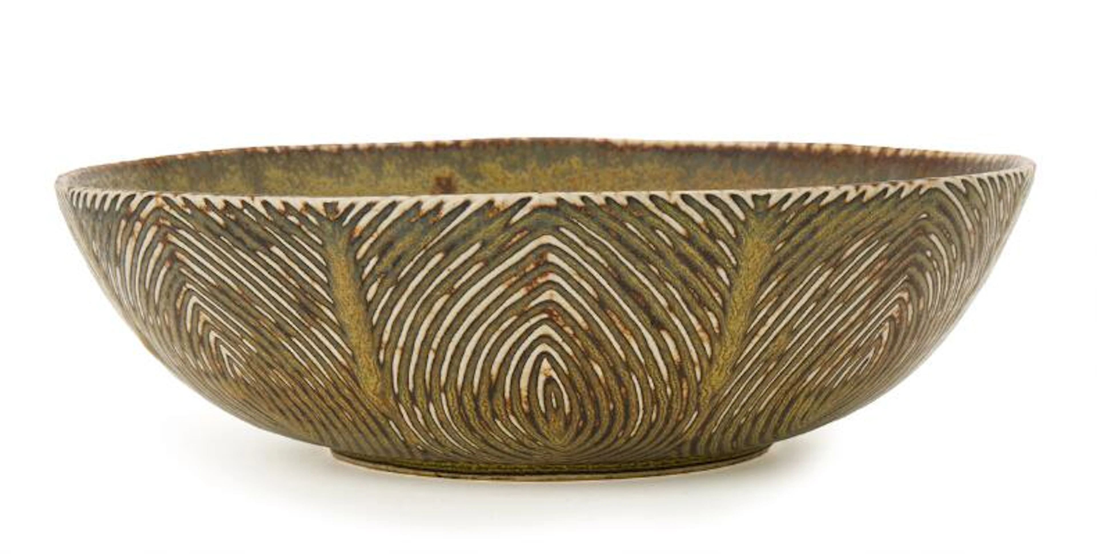 Axel Salto: A circular stoneware dish, exterior modelled in fluted