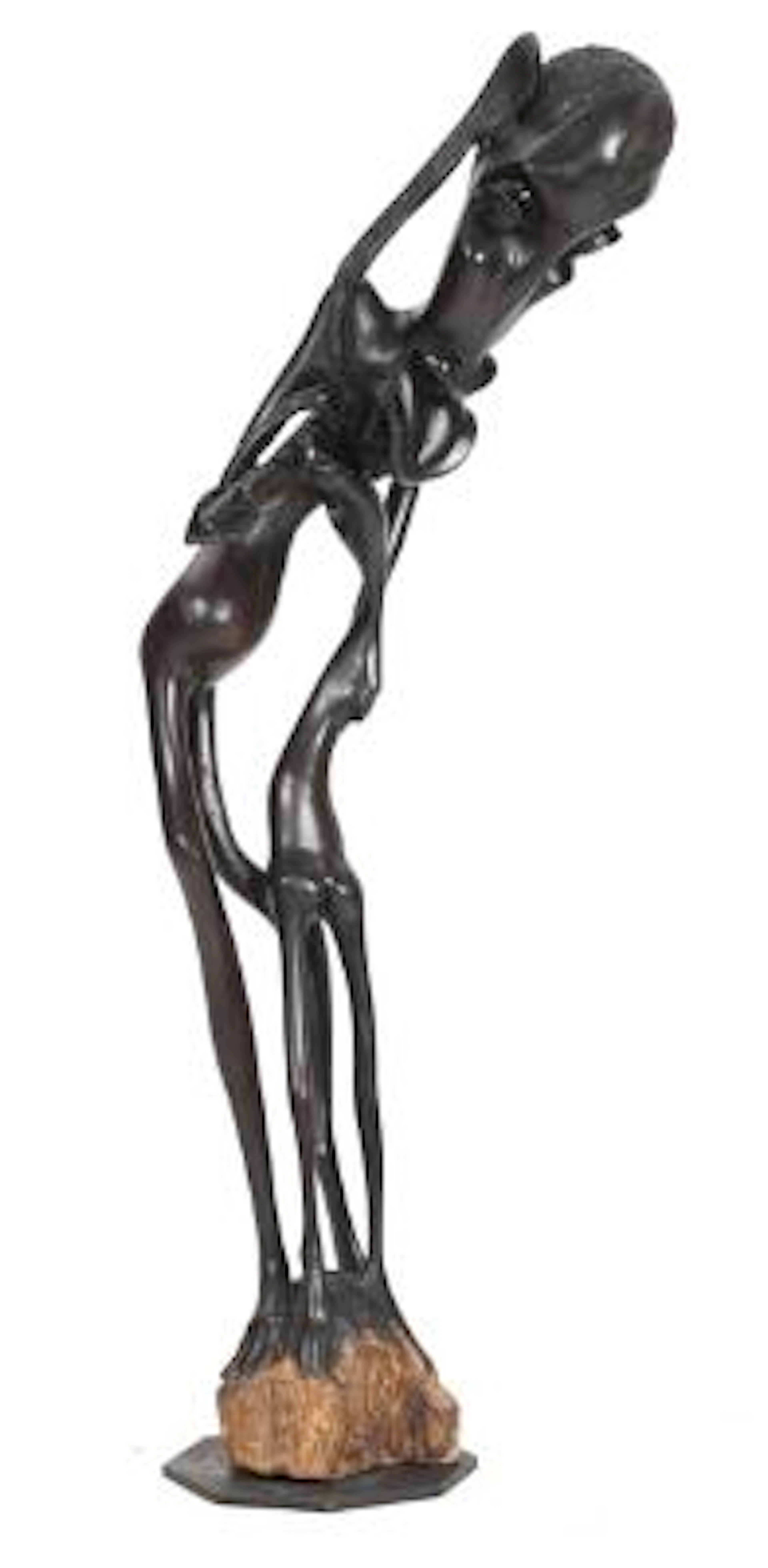 A carved hardwood figure. Makonde. 20th century. H. 123 cm. – Bruun