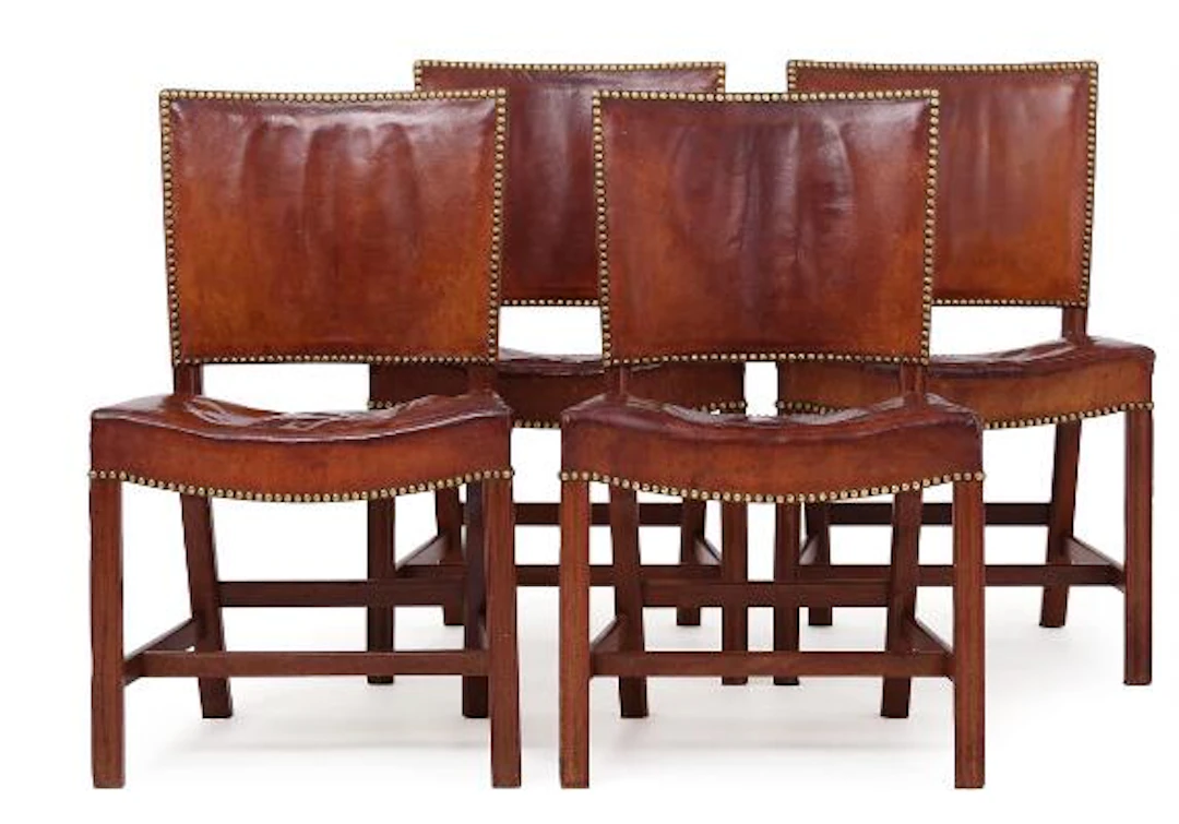 Kaare Klint: “The Red Chair”. Set of four mahogany chairs. Upholstered
