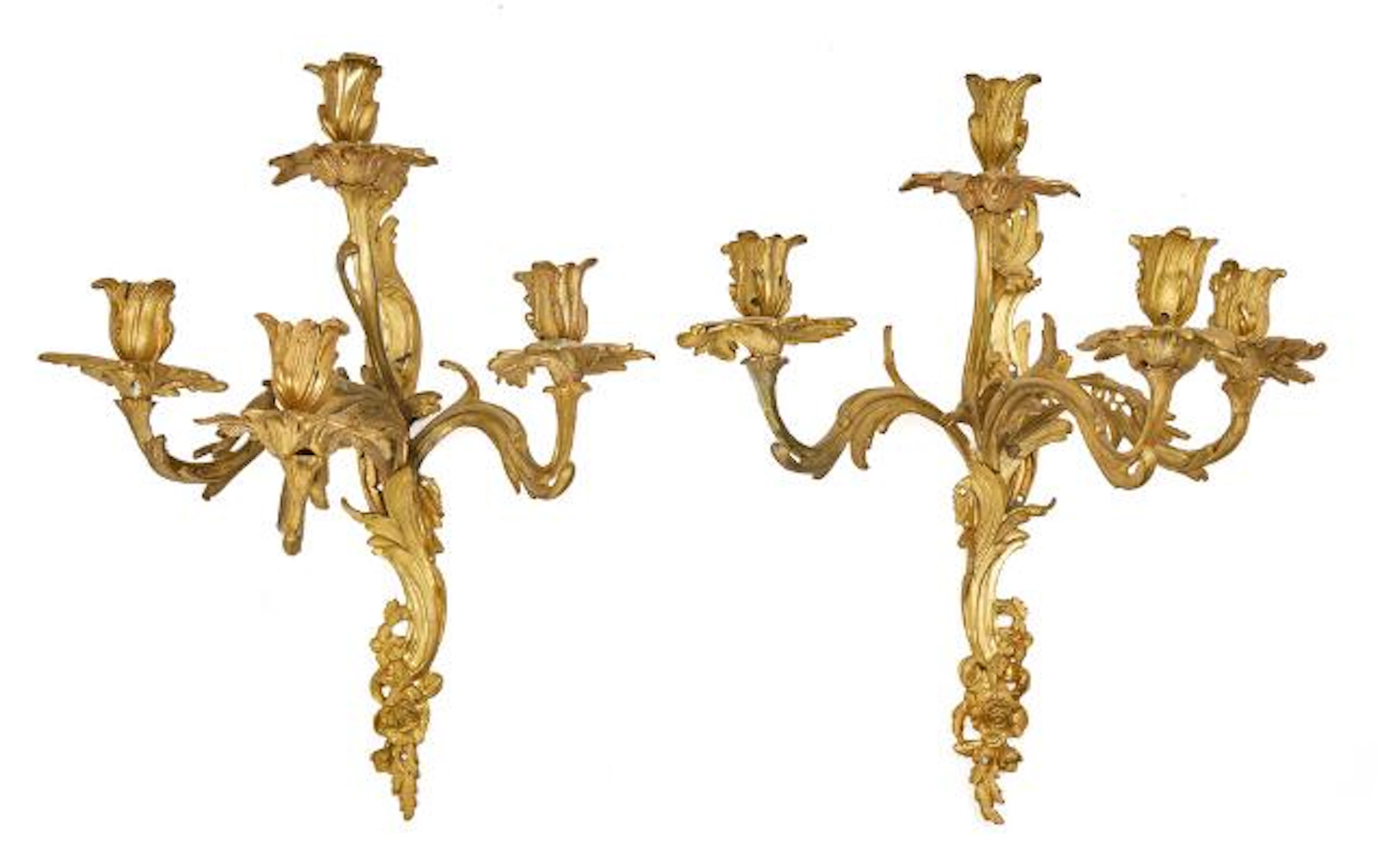 A pair of French Rococo style sconces in gilded bronze. 19th century.