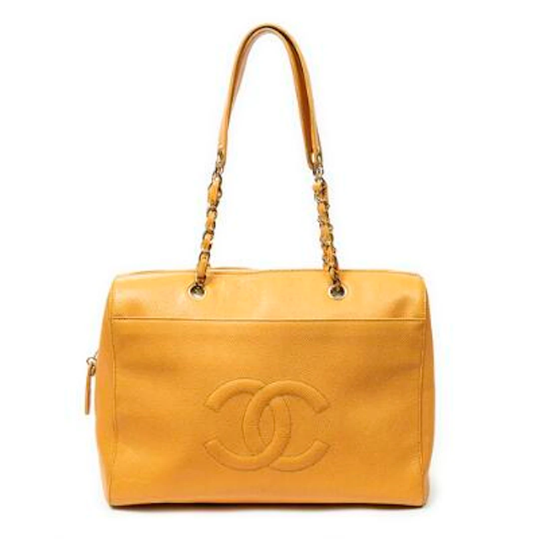 Chanel: A "CC Zip Boston Chain" tote bag of orange caviar leather
