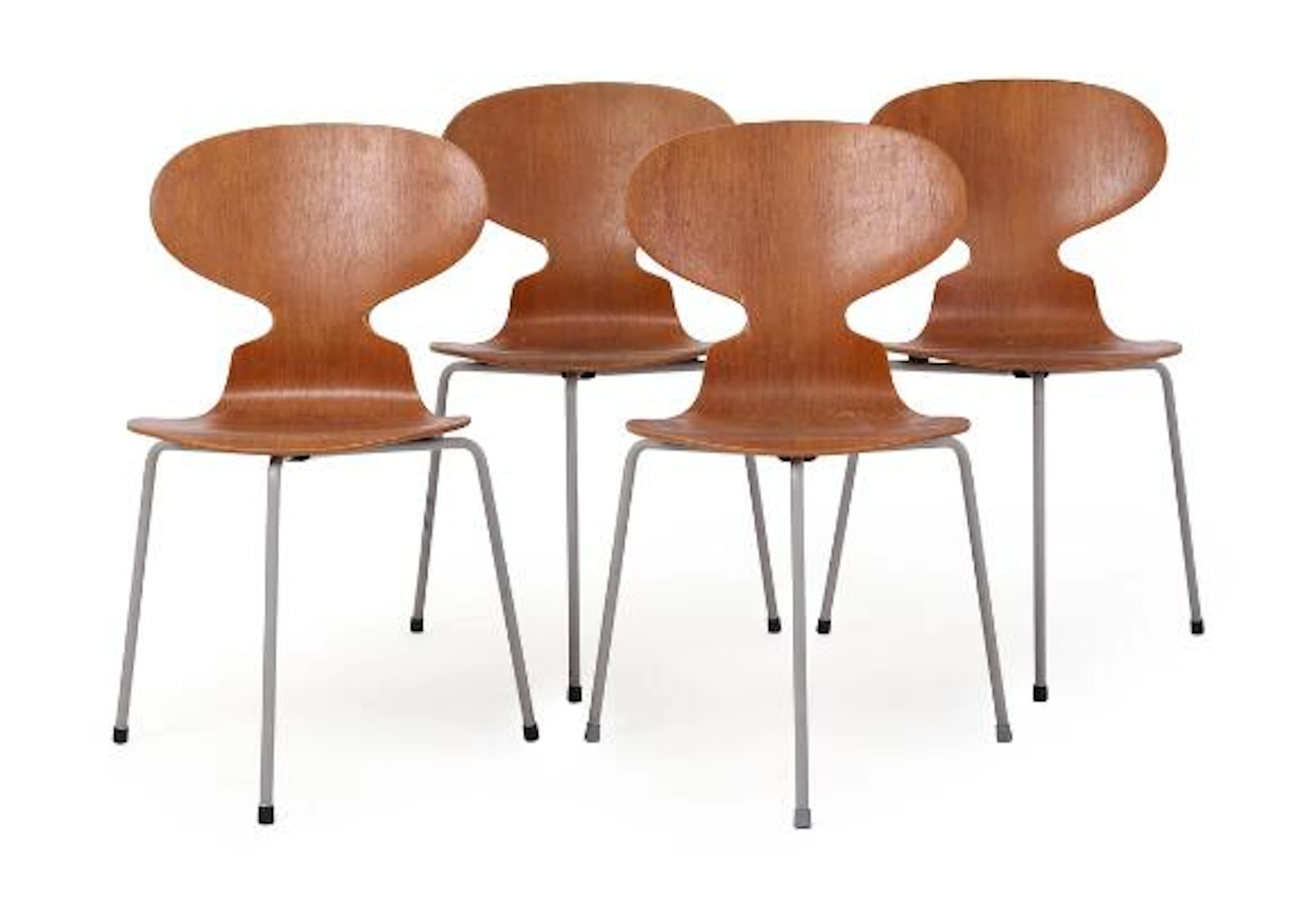 Arne Jacobsen: "Myren". A set of four chairs with three-legged metal