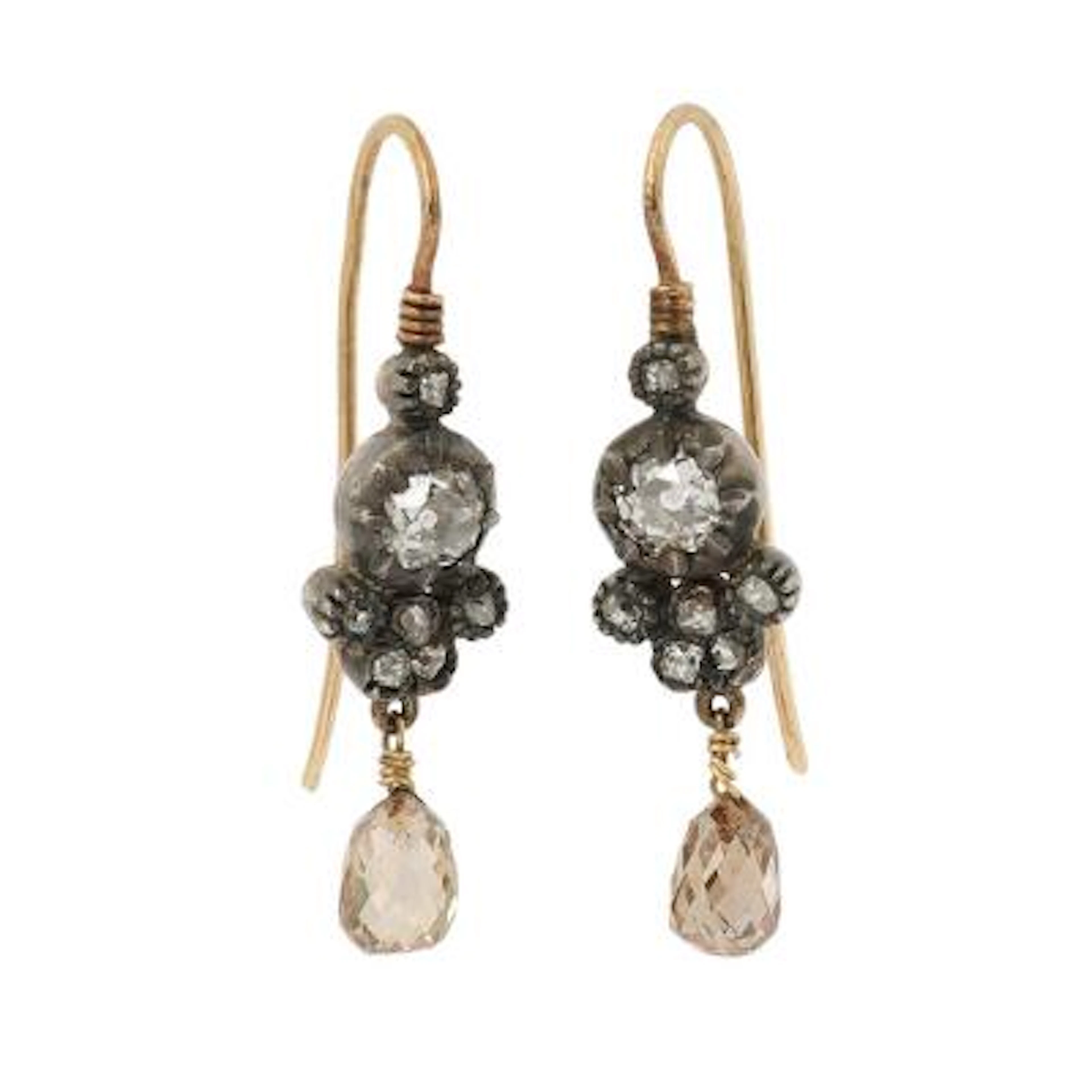 The Marriage of Figaro. A pair of diamond ear studs each set with