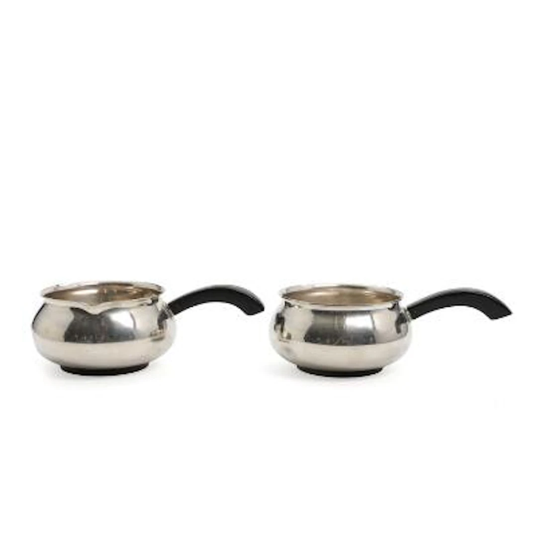 A. F. Rasmussen: Two sterling silver casseroles with bakelite handles.
