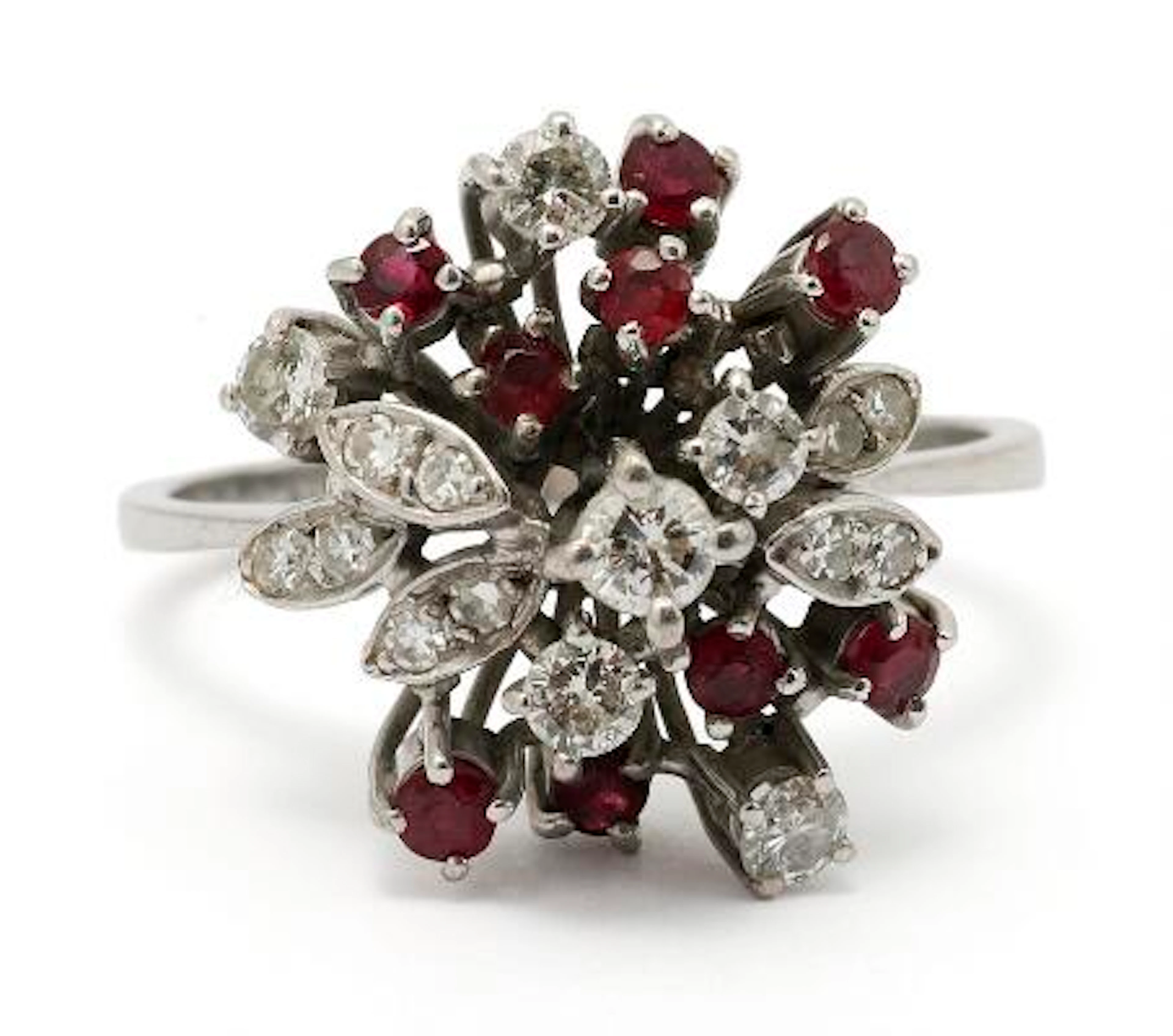 A ruby and diamond ring set with numerous rubies and diamonds mounted