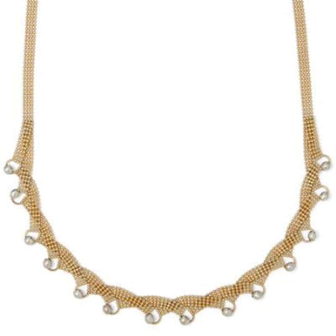 A necklace of 14k gold with beads of 14k white gold. Weight app. 11.5