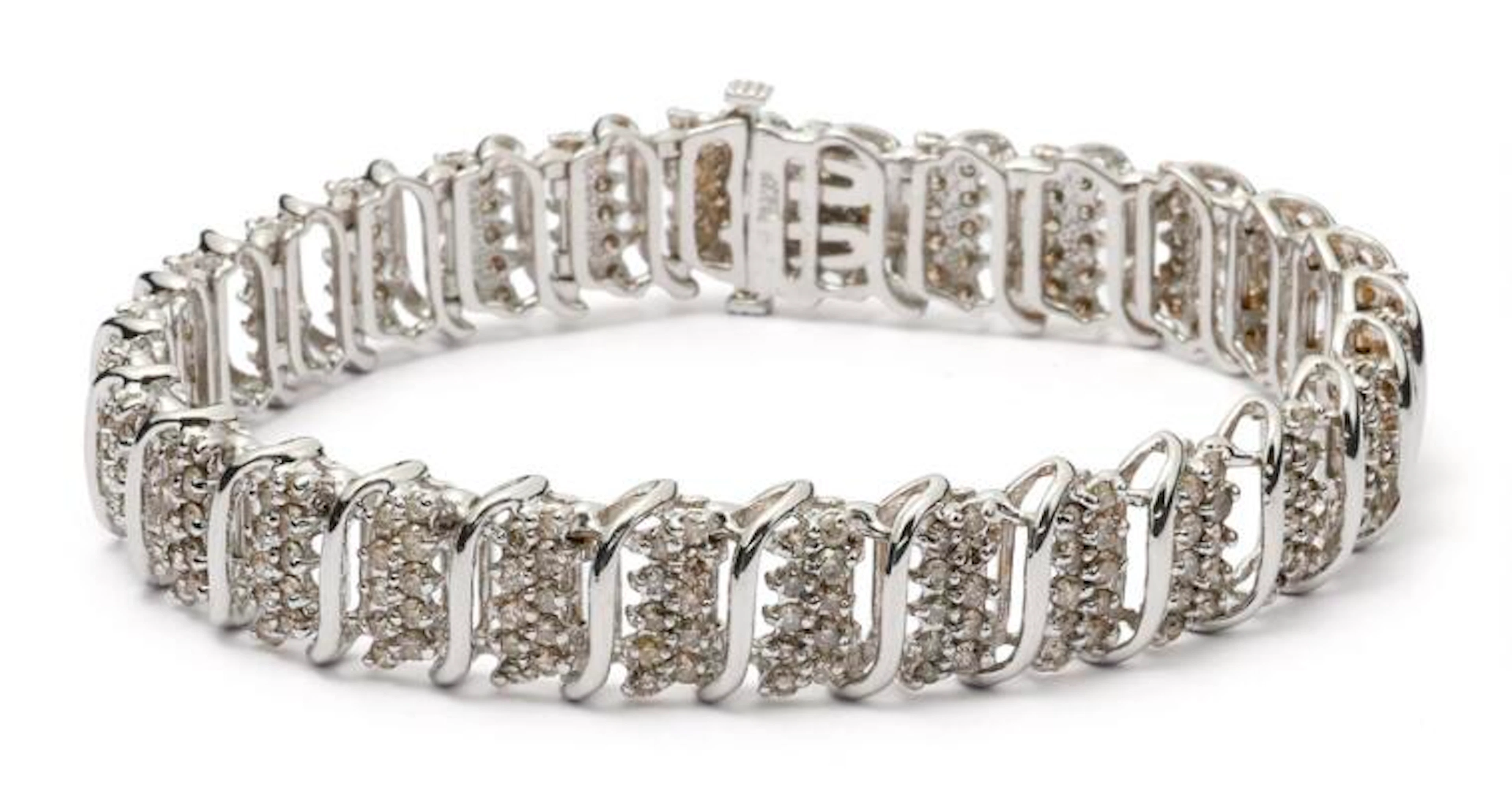 A diamond bracelet set with numerous diamonds mounted in 14k white