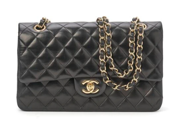 Chanel: A "Classic Double Flap" bag of black quilted lamb skin with