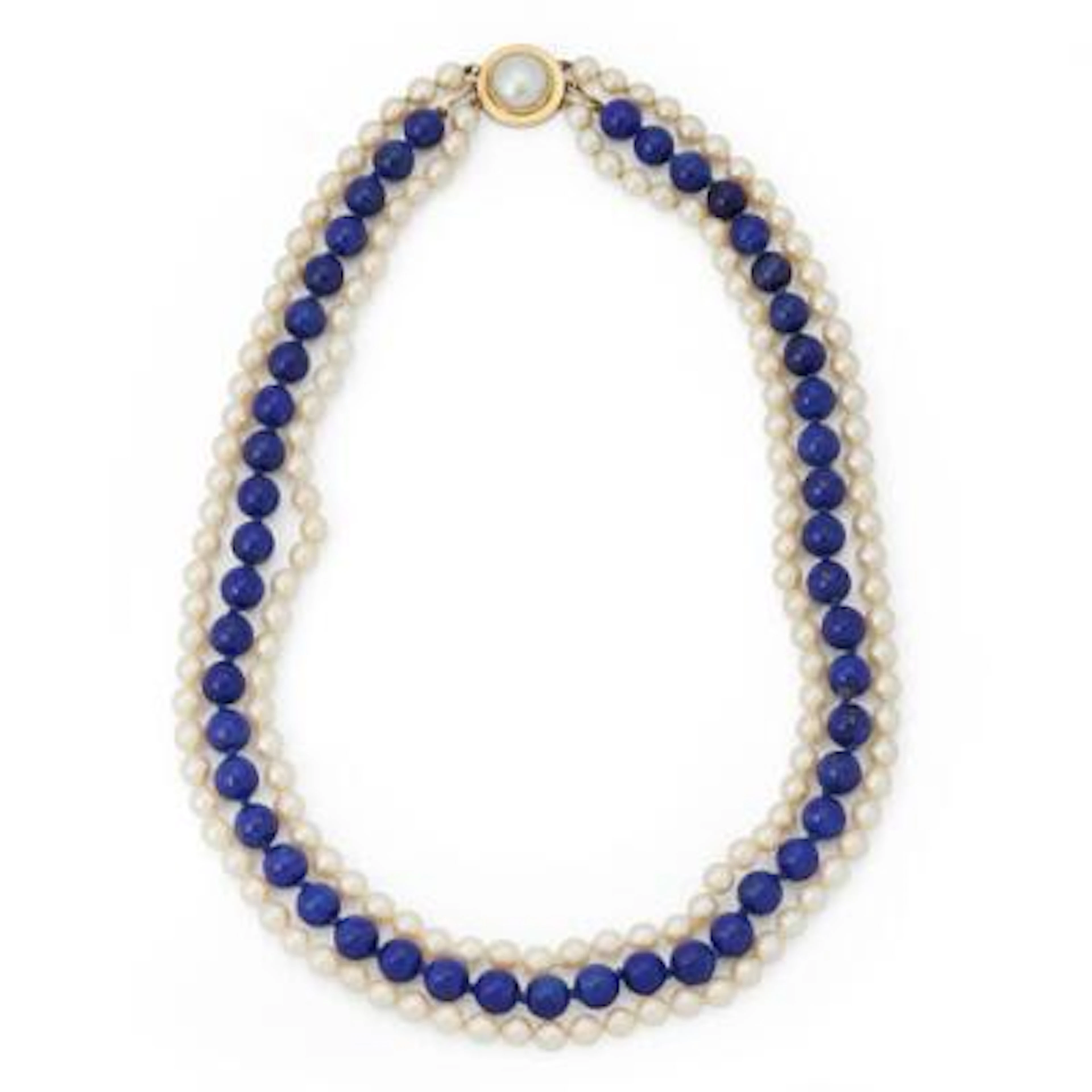 A three-strand pearl necklace set with cultured pearls and lapis lazuli