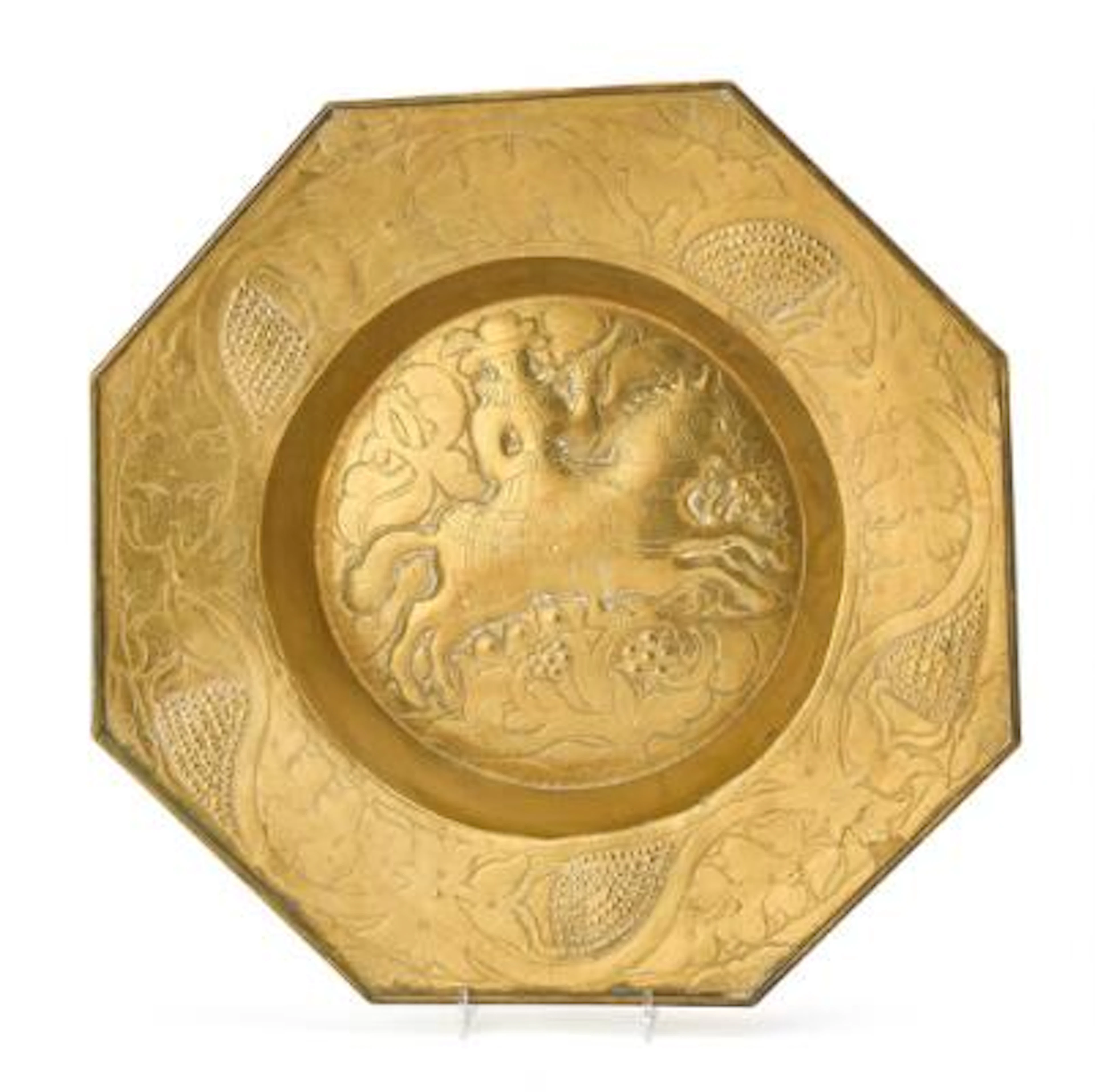 A BaroquedDish of repoussé brass, octagonal form. 17th Century. Diam.