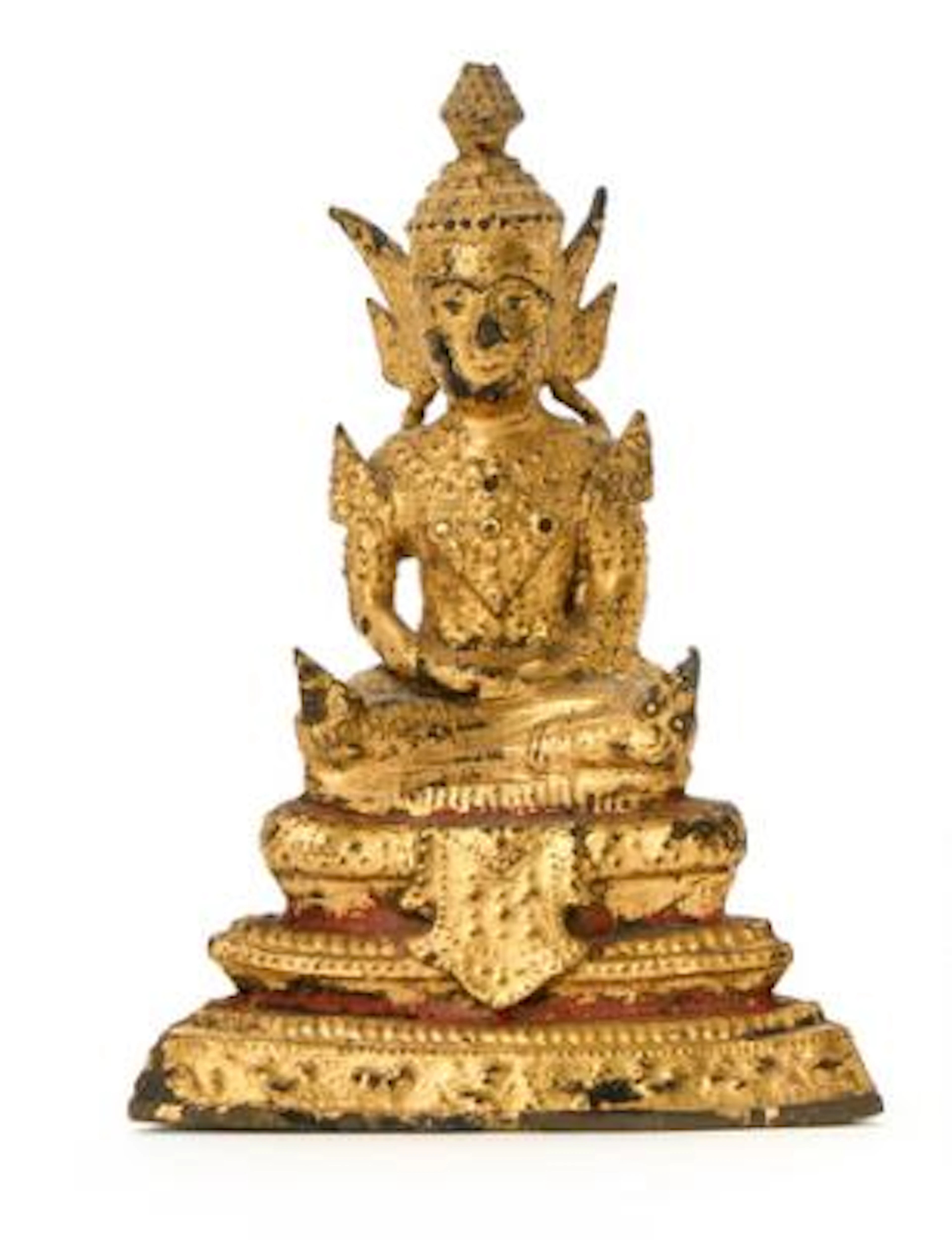 Buddha seated on a throne. Figure of gilt and partially painted bronze.
