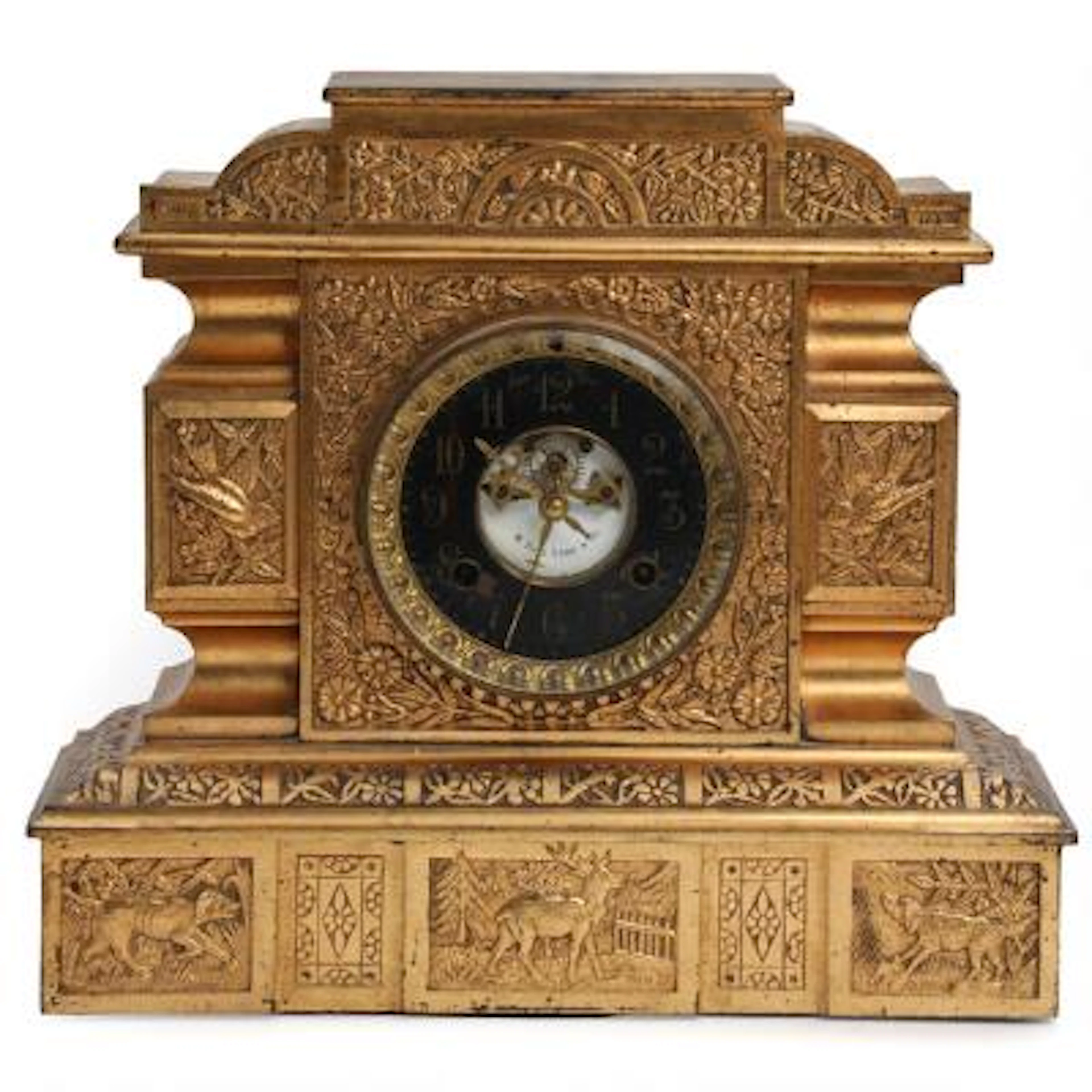 English mantel clock of gilded metal. Dial signed W. Duke Sons & Co.