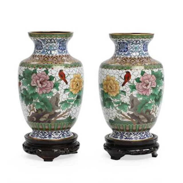 A pair of Chinese cloisonné vases, decorated with peonies and birds.