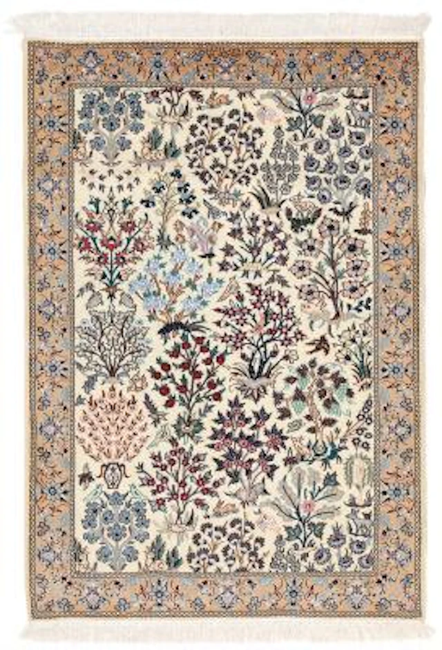 A signed nain rug, Persia. Design of trees and animal motifs. C. 640.000