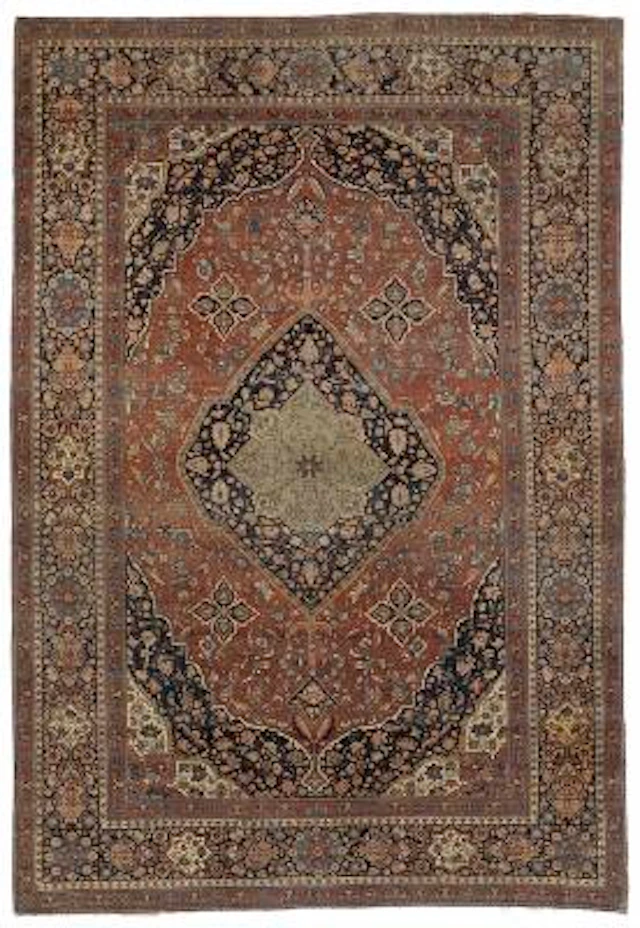 An antique Kashan Mohtasham carpet, Persia. Classical stylized medallion