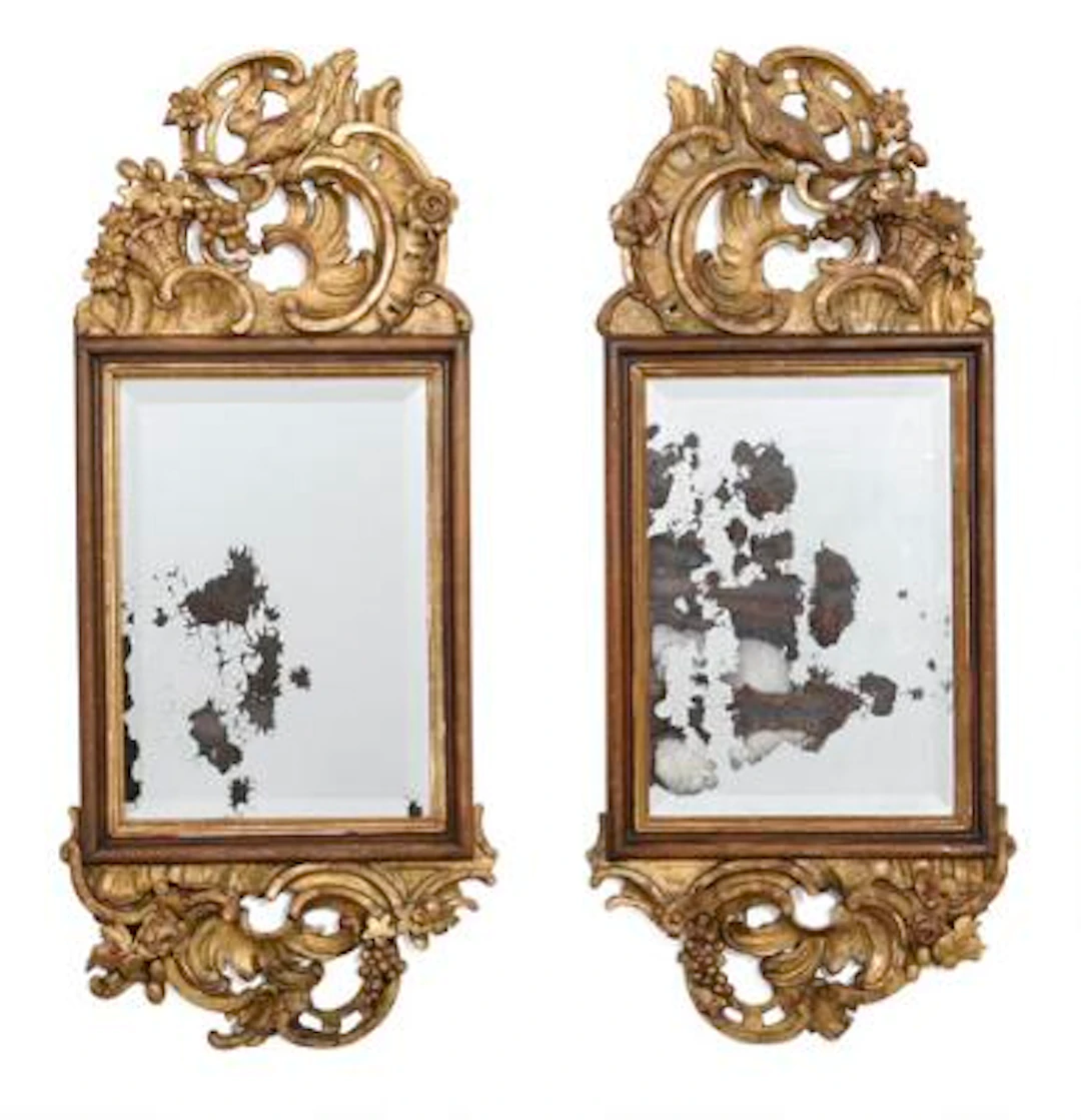 A pair of mirrors in oak frames with facet cut mirror glass. Partly