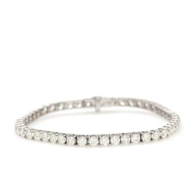 A diamond tennis bracelet set with 49 brilliant-cut diamonds weighing