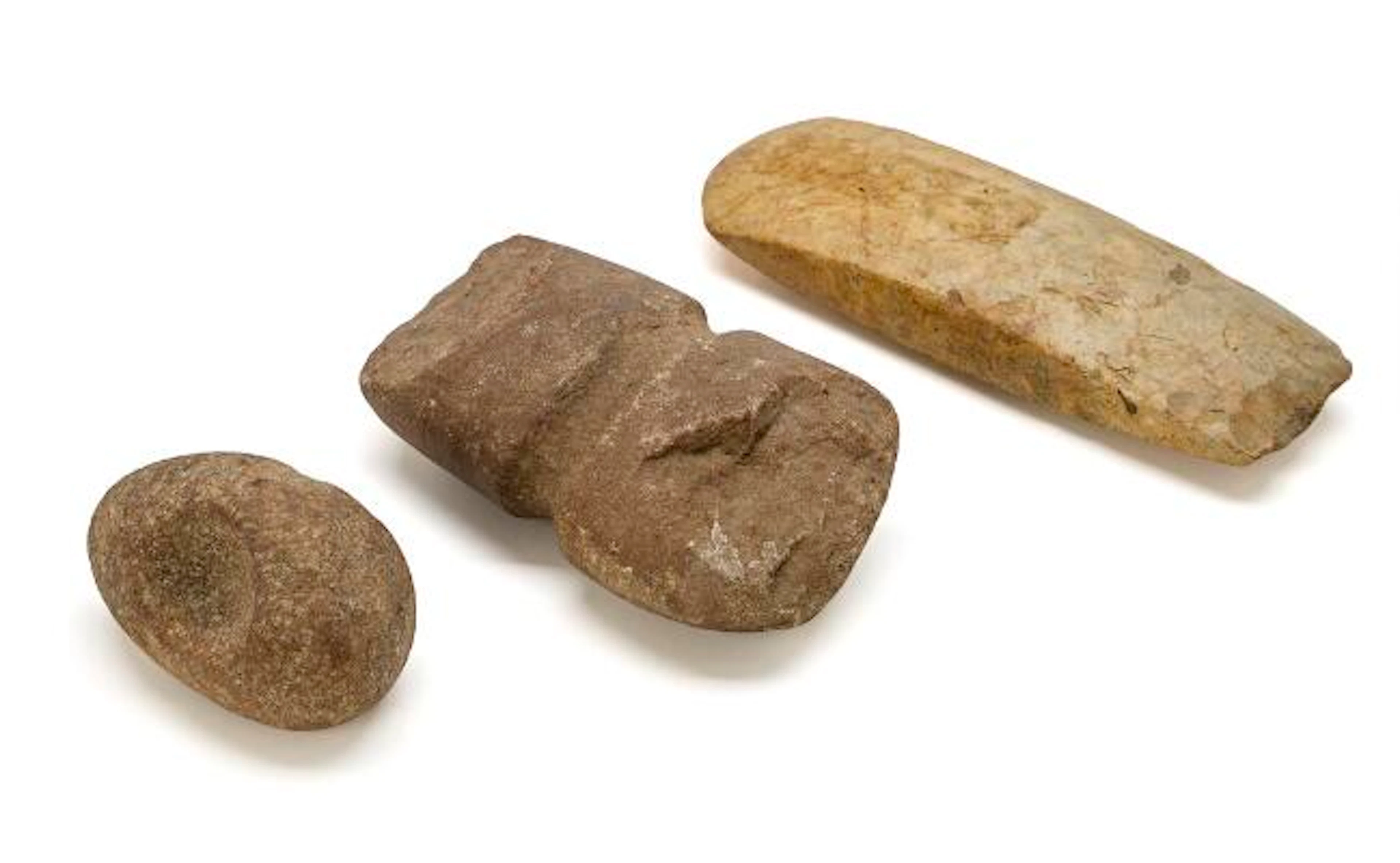 n axe made of stone with central shaft grooves, a thin butted flint