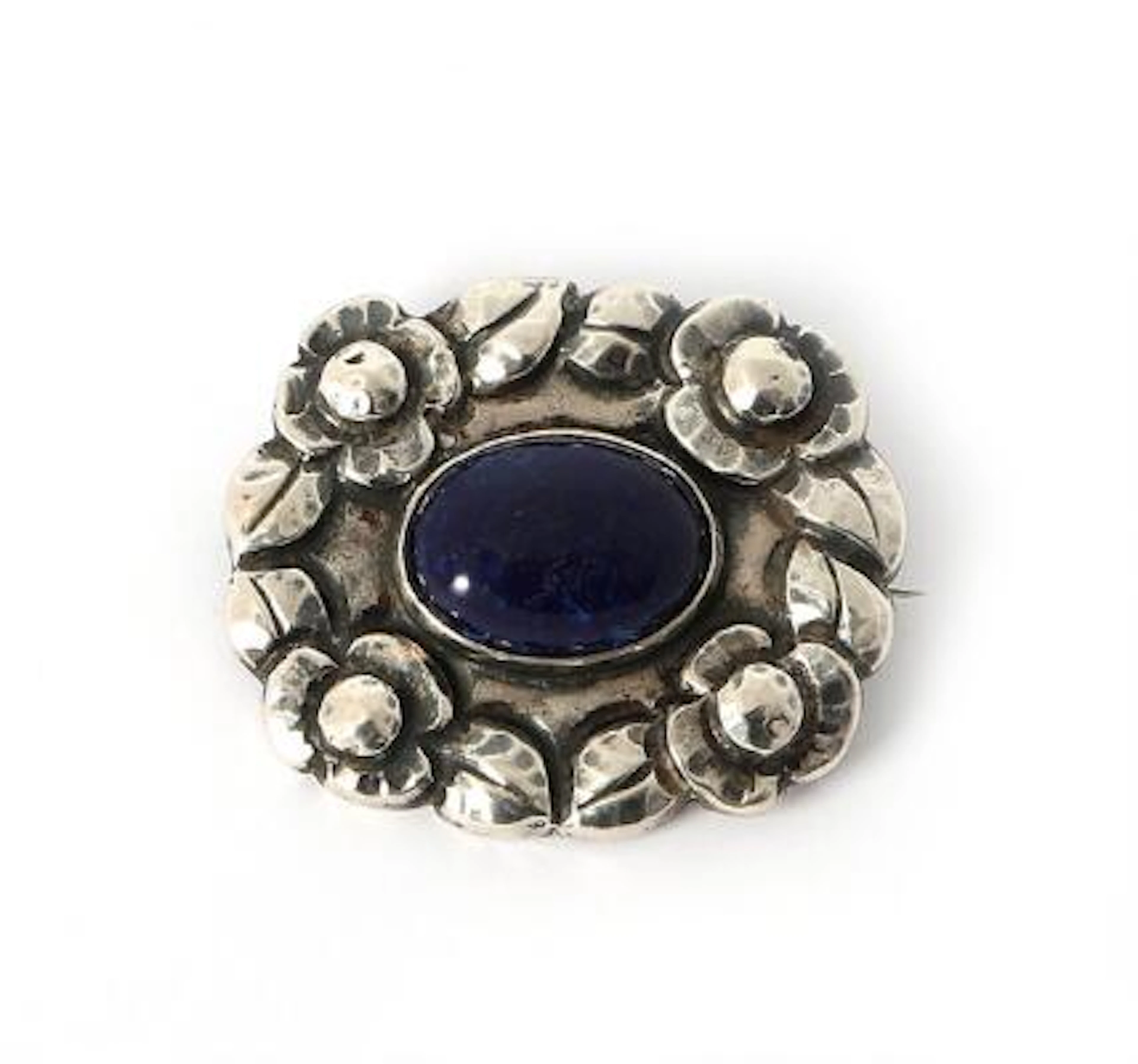Harald Krogh: A jasper brooch set with a cabochon jasper, mounted