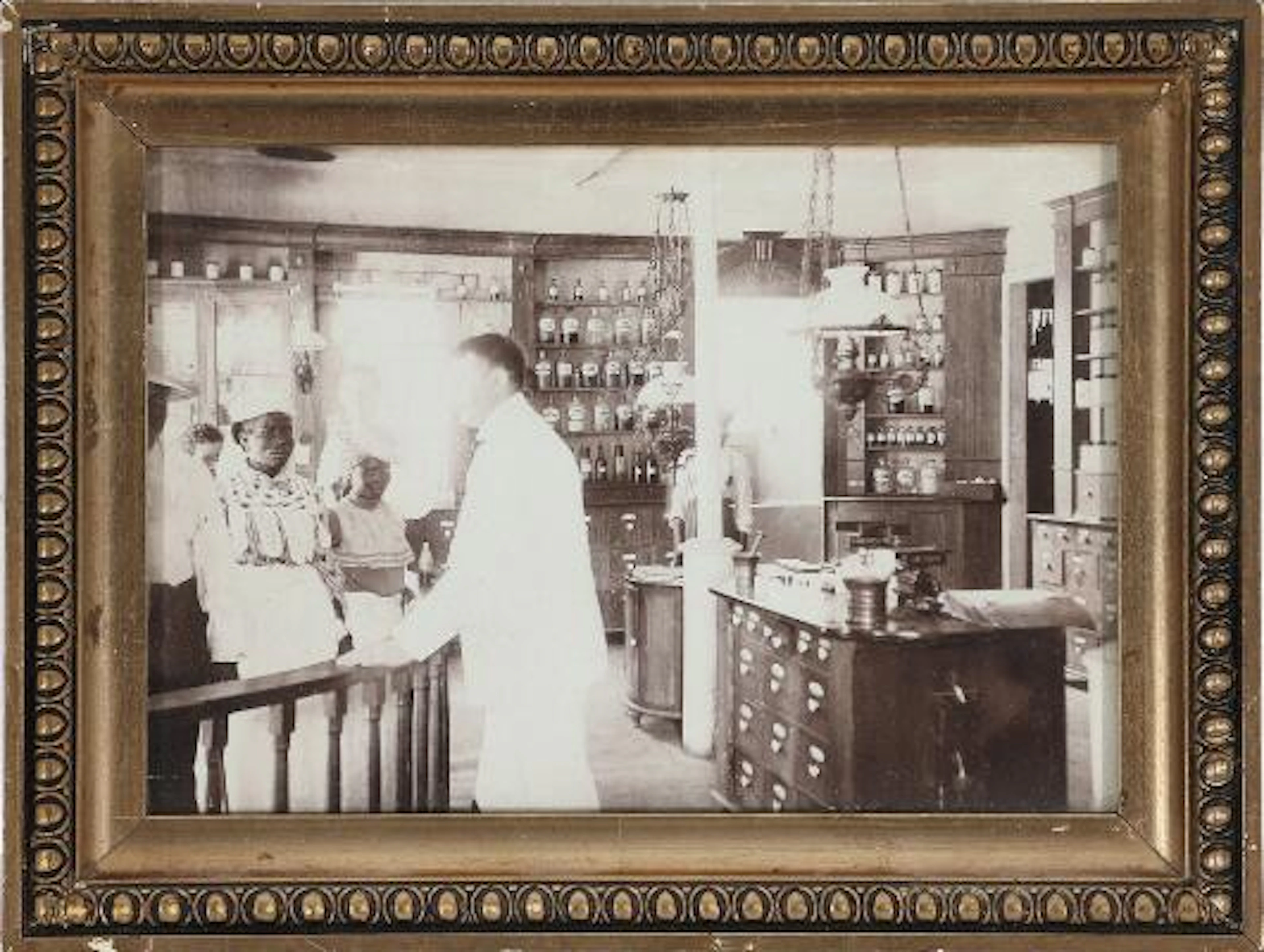 Four black-and-white silver gelatin photographs from A.H. Riises's
