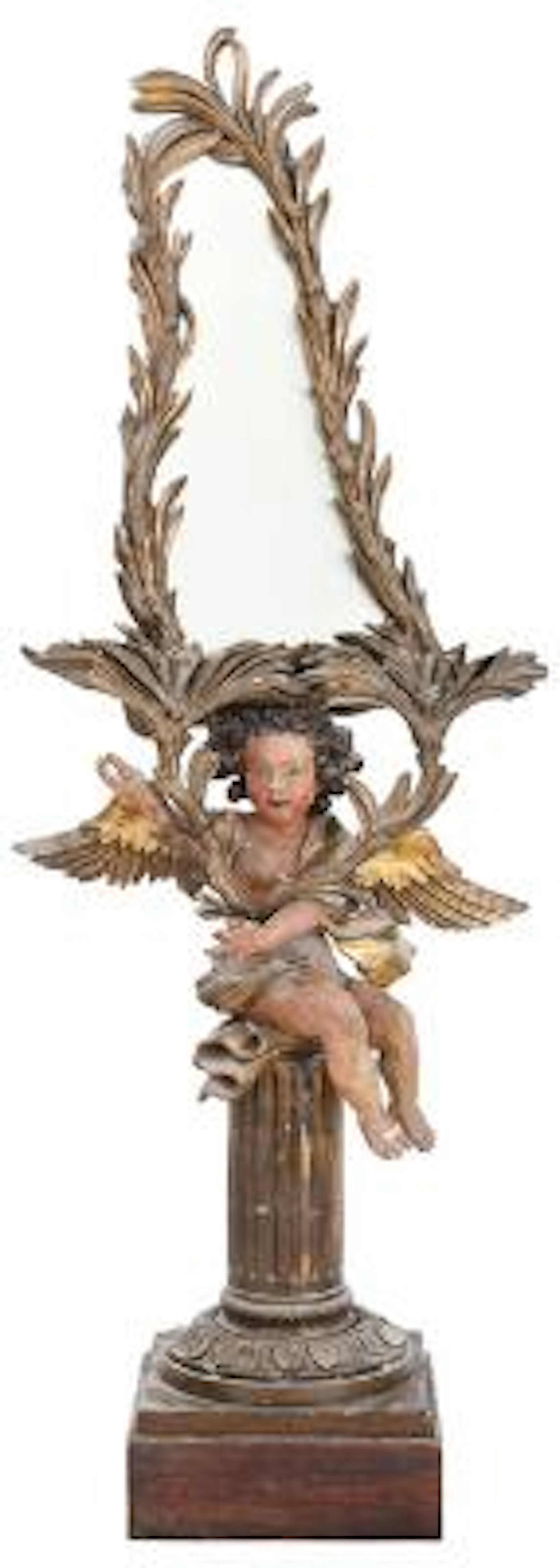 A richly carved Baroque style mirror with putto sitting on plinth.