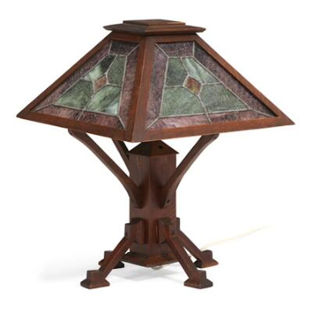 American Arts and Craft table lamp in stained oak. Shades in coloured