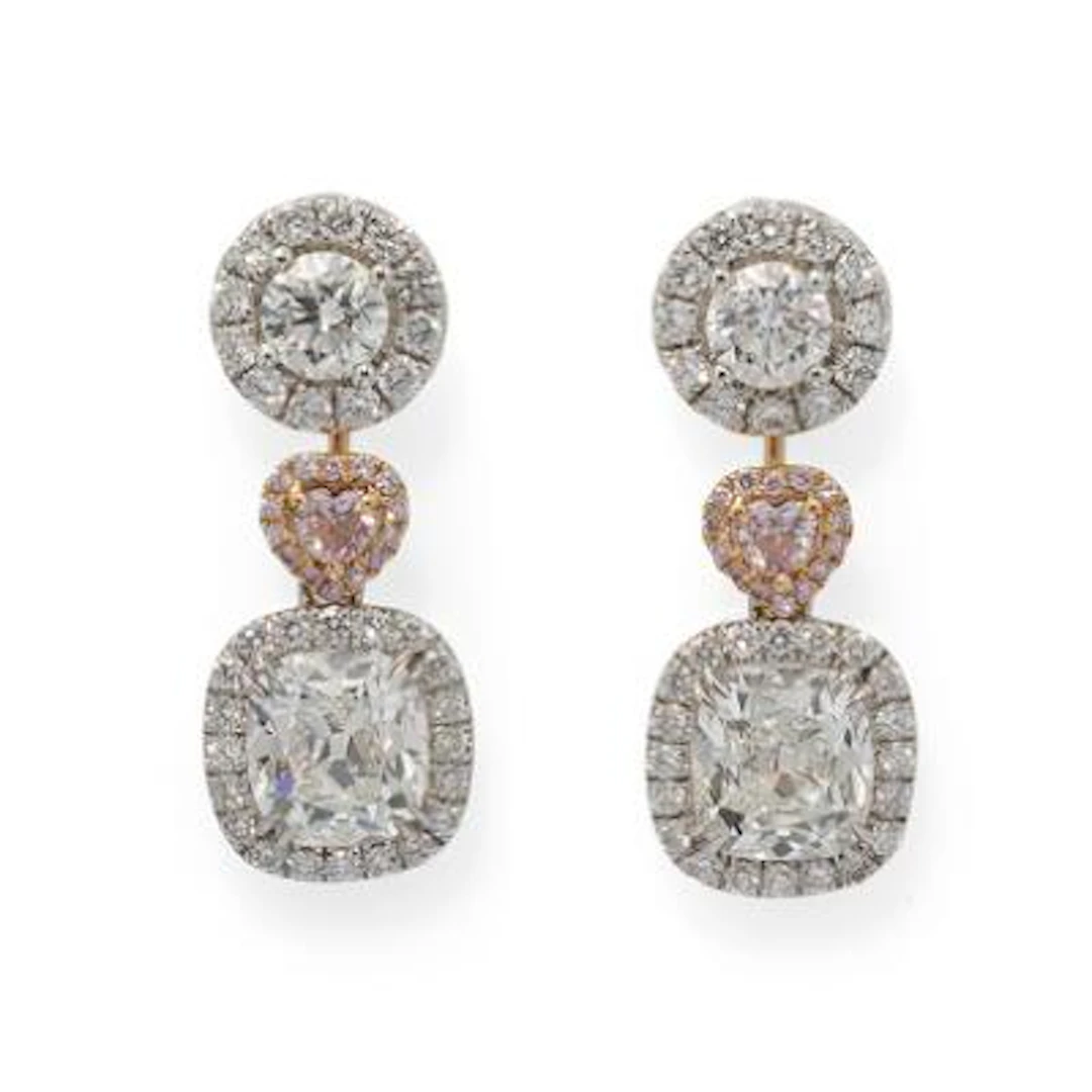 Ruben Svart: A pair of diamond ear studs and pendants set with partly