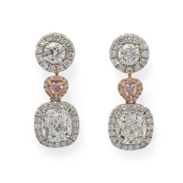 Ruben Svart: A pair of diamond ear studs and pendants set with partly