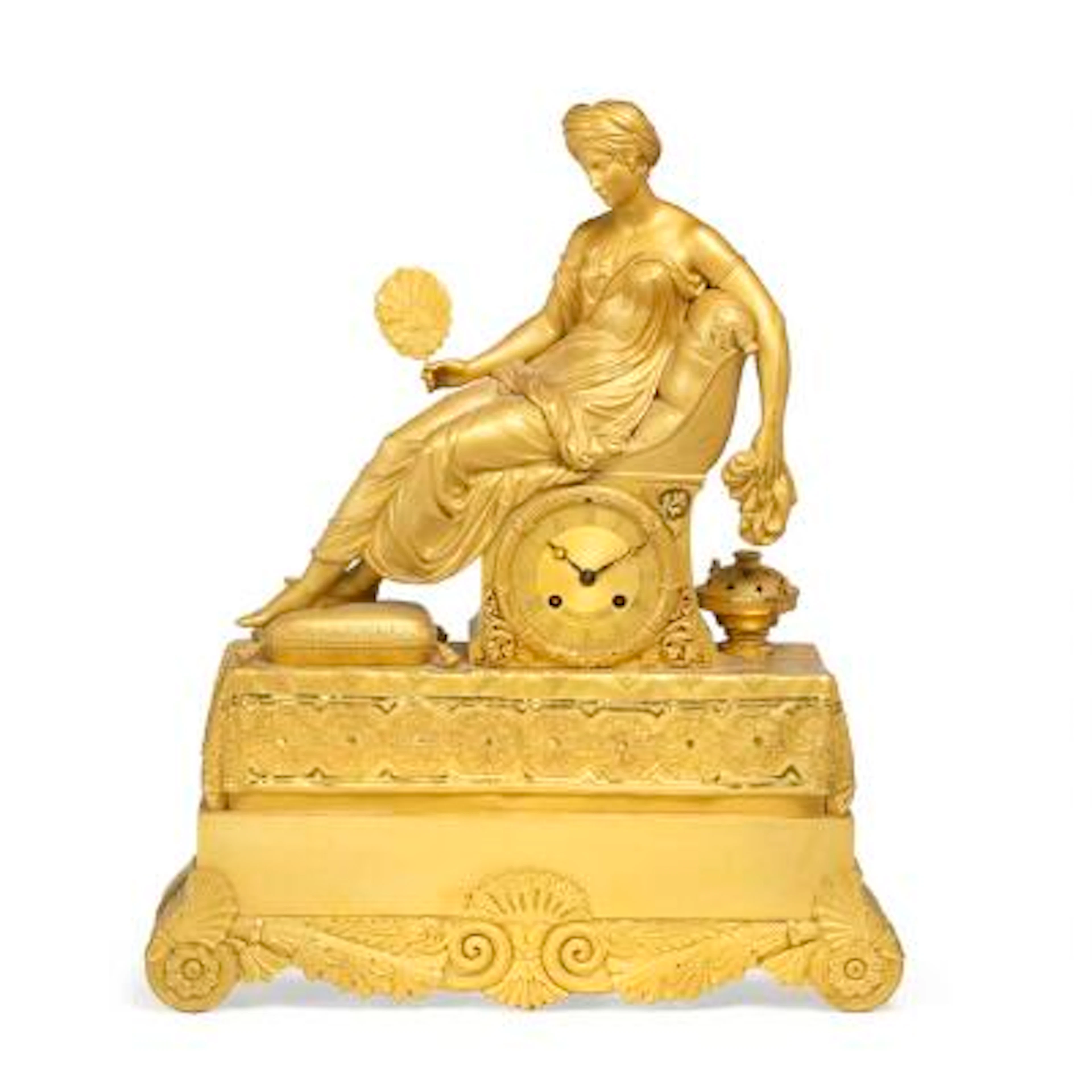 A Charles X figural table clock. The dial is signed 'Nicoll a Paris'.