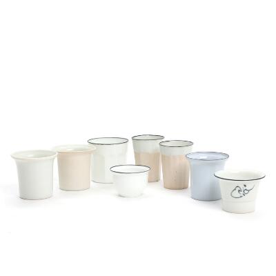 Bodil Manz, Richard Manz: Seven porcelain cups and one bowl. Signed