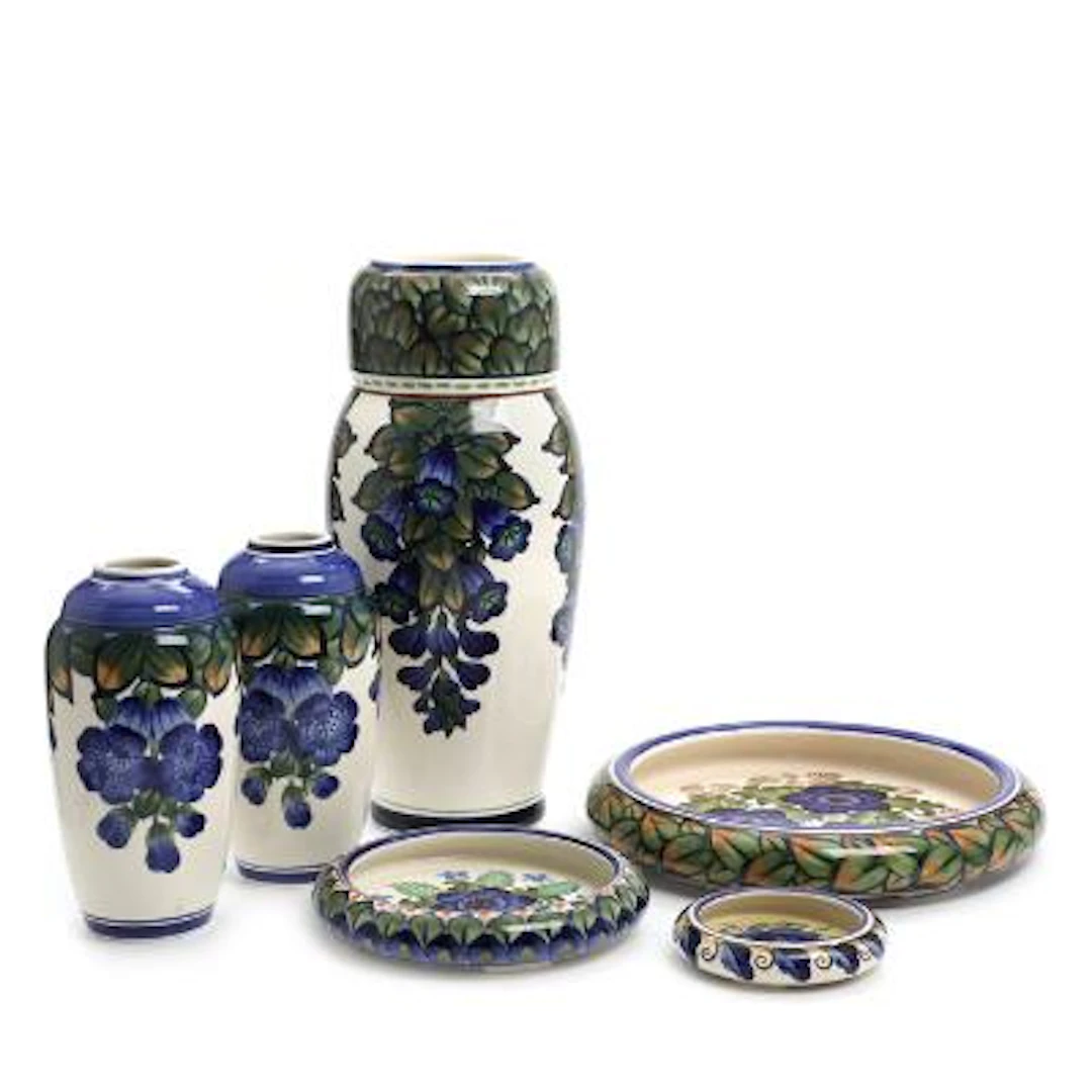 Slender vase, a pair of vases and three bowls of faience. Aluminia.