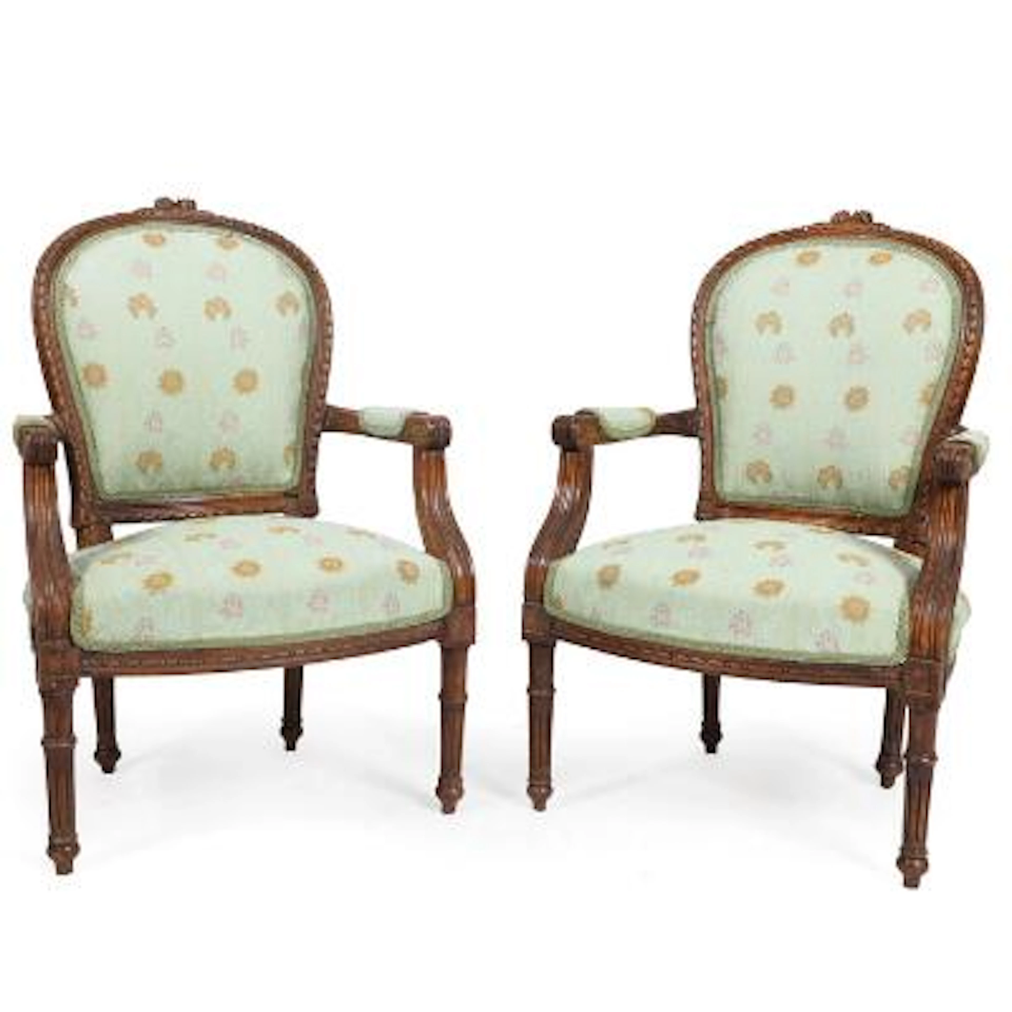 A pair of late 19th century Louis XVI style oak wood armchairs. (2)