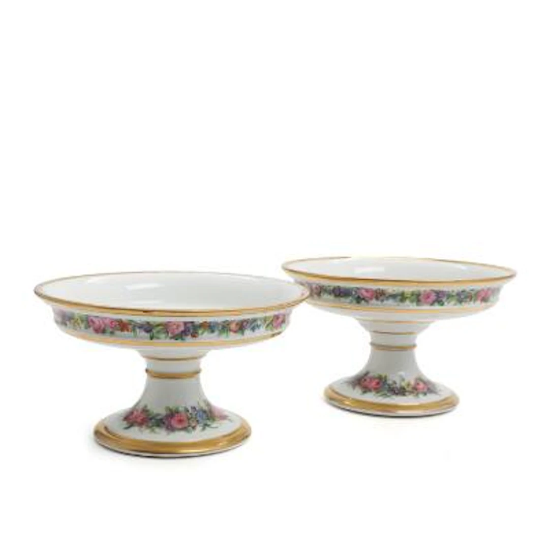 A pair of French Schoelcher porcelain centrepieces, decorated with
