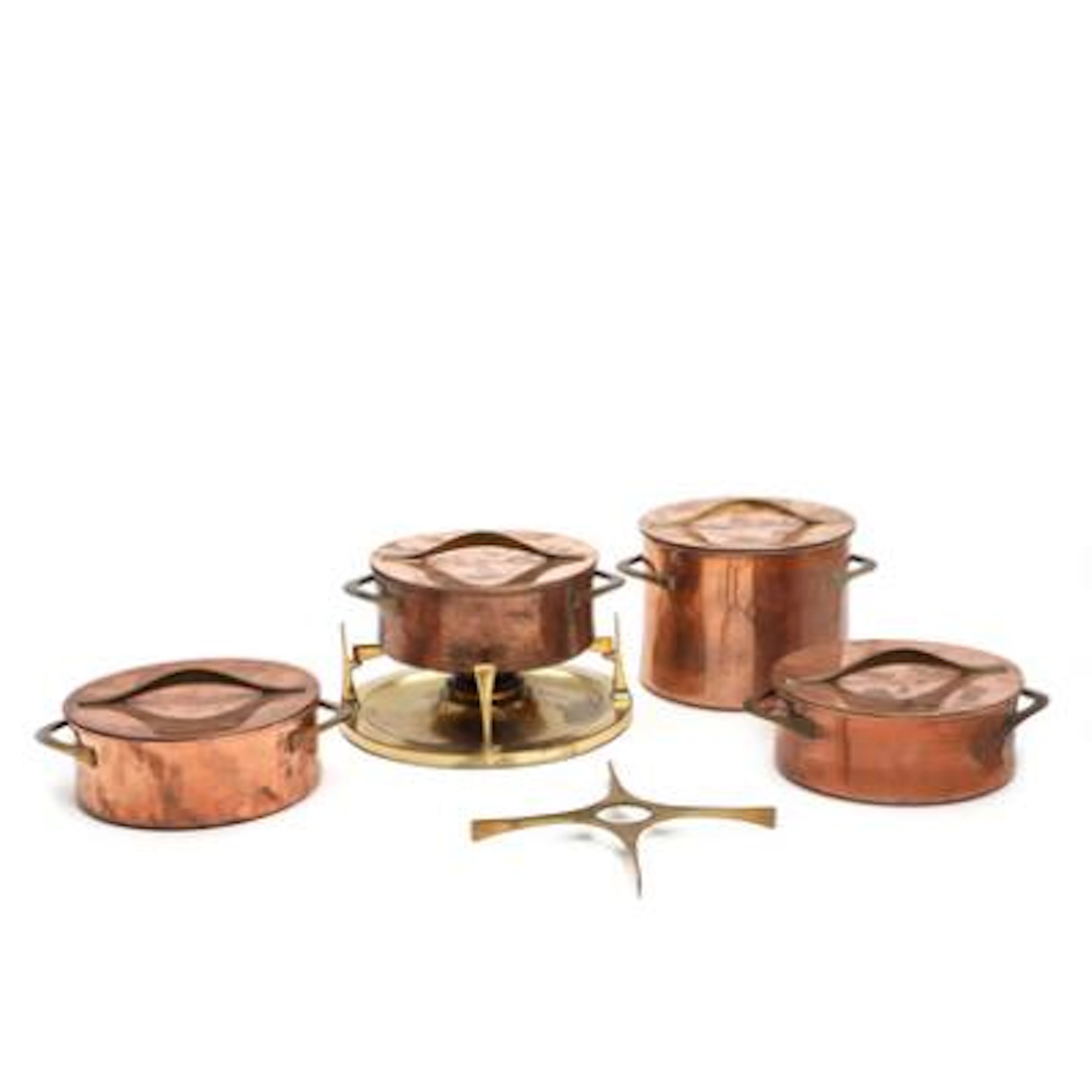 Jens H. Quistgaard: A copper and brass fondue pot with burner, three