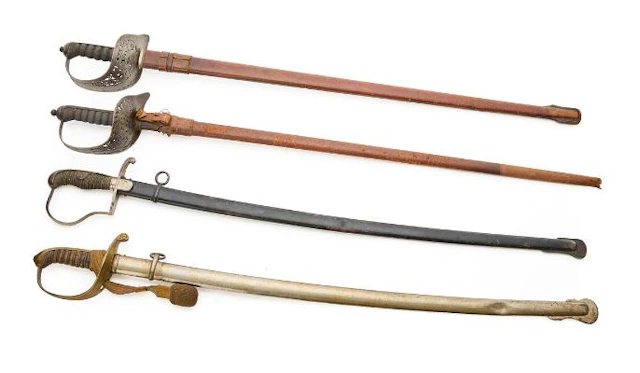 Four sabres with scabbards. – Bruun Rasmussen Auctioneers