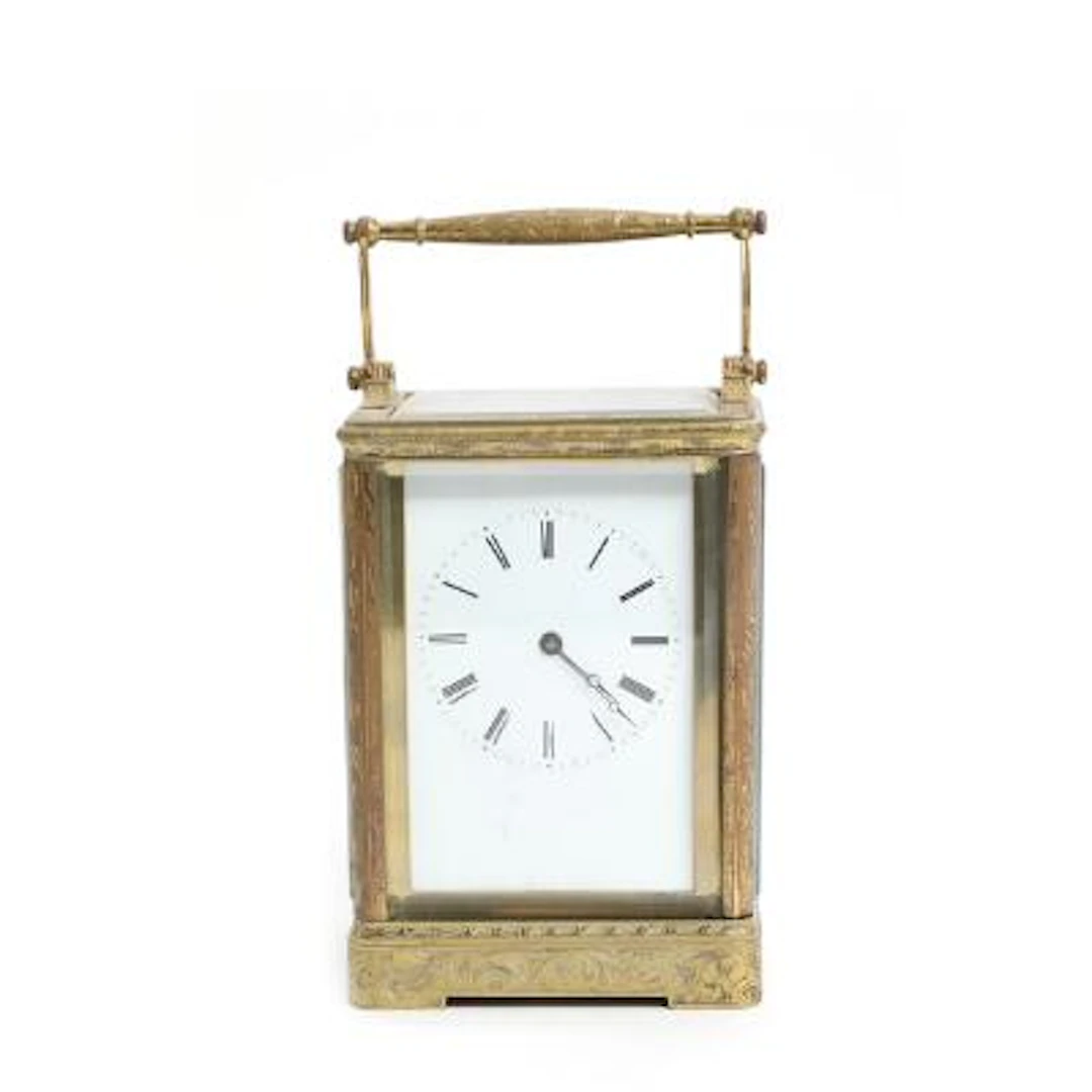 Valery Paris: French brass travel clock with richly engraved foliate