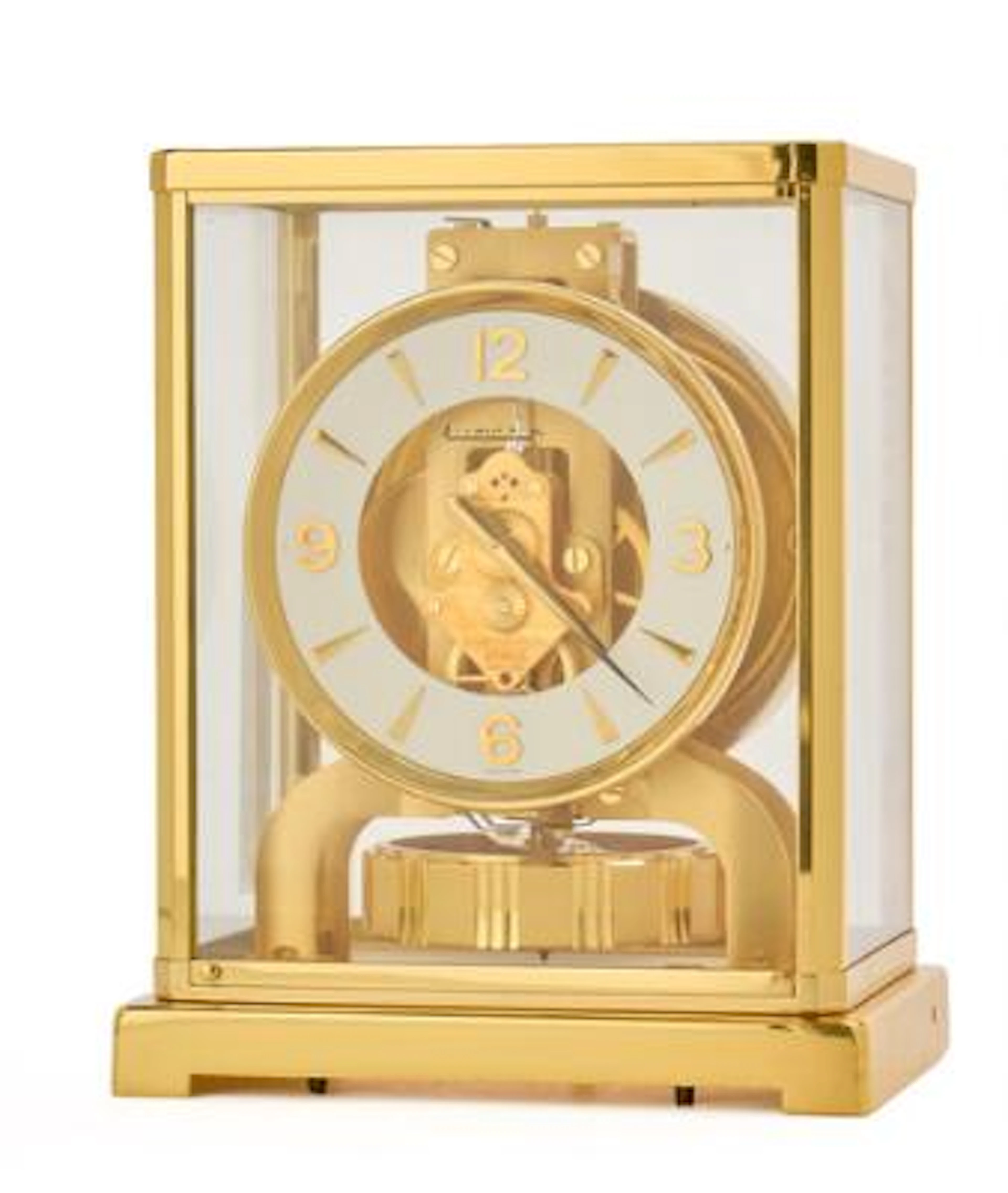 Jaeger-LeCoultre: Atmos, table clock in case of brass and glass. Marked