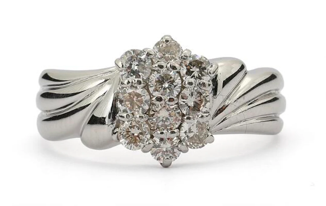 A diamond ring set with numerous brilliant-cut diamonds, mounted in