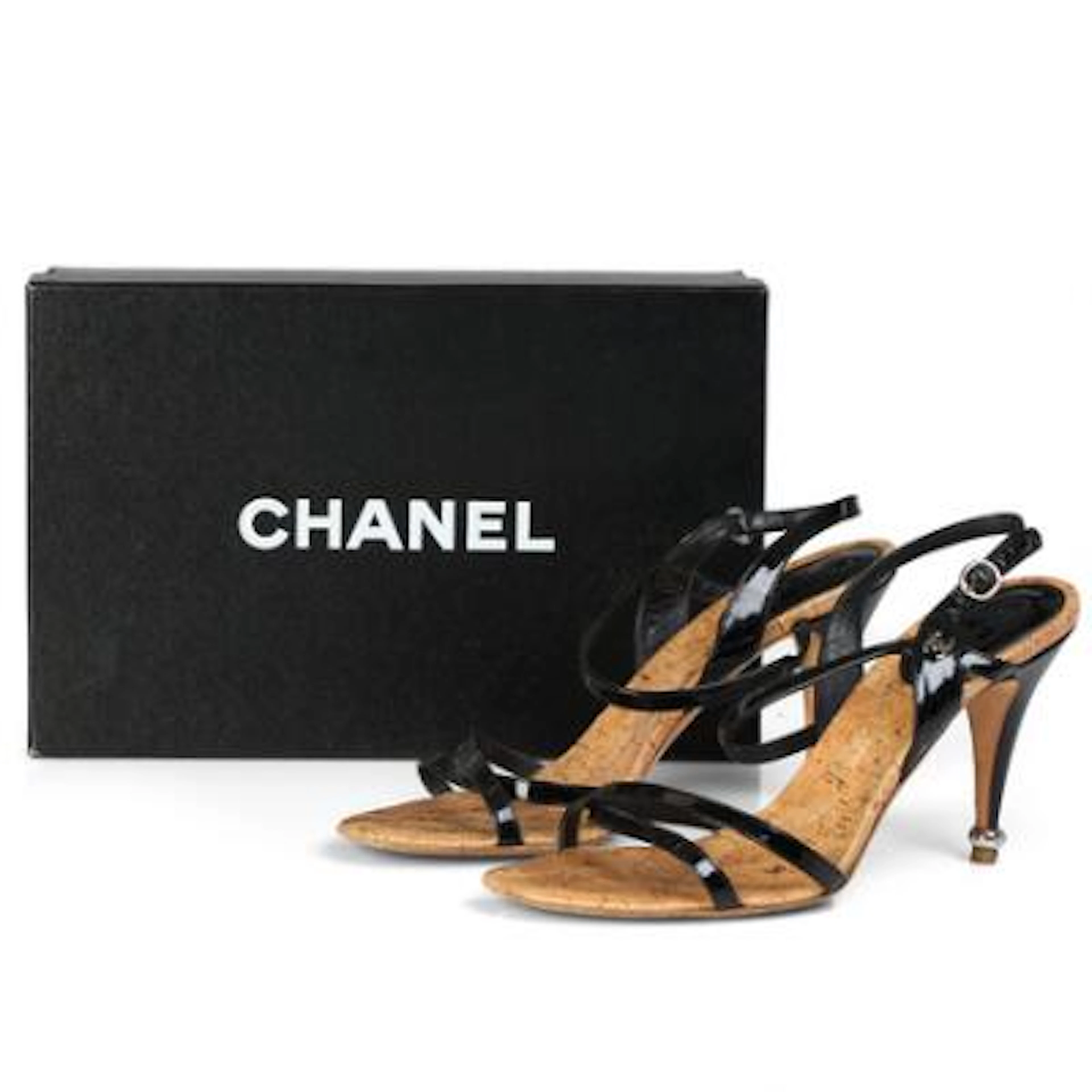 Chanel: A pair of stilettos of black patent leather with an adjustable