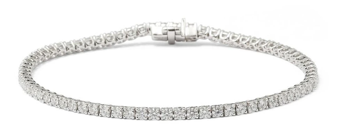A diamond bracelet set with numerous diamonds weighing a total of