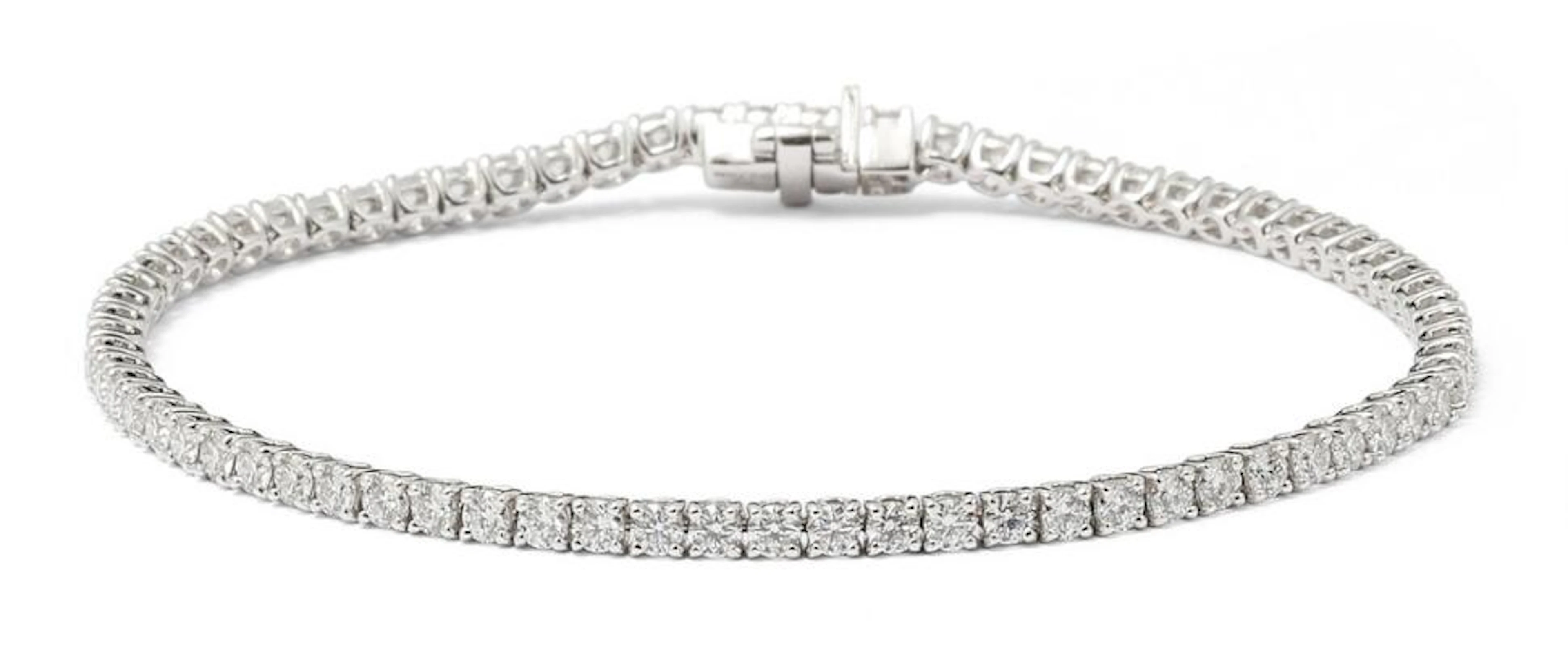 A diamond bracelet set with numerous diamonds weighing a total of