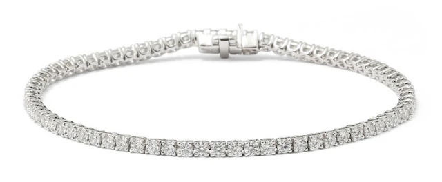 A diamond bracelet set with numerous diamonds weighing a total of