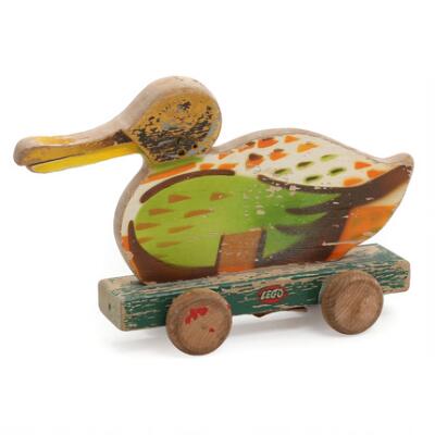 LEGO: A paint wooden pull duck on wheels with sound and moveable beak