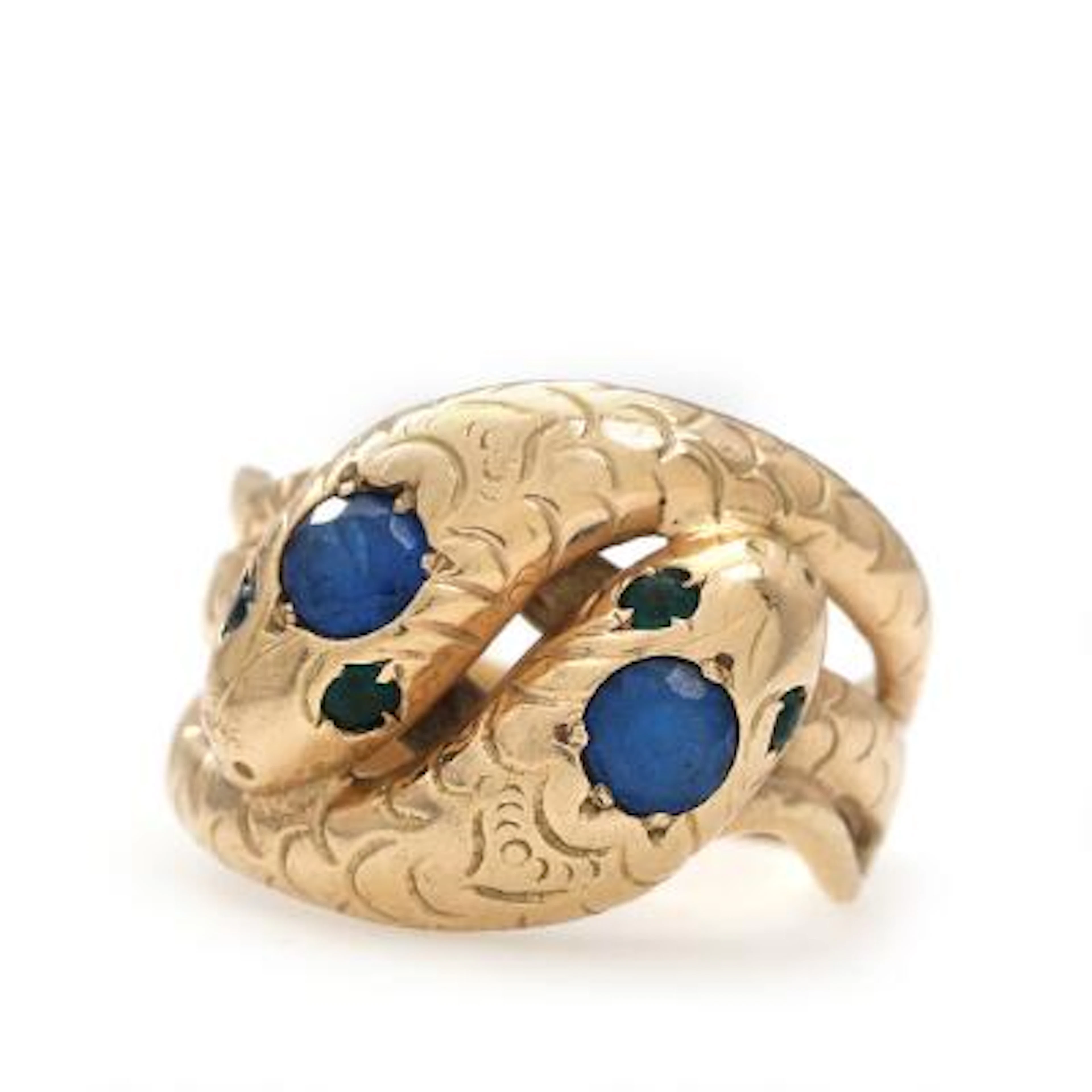 A spinel ring in shape of snakes set with spinel, mounted in 14k gold.