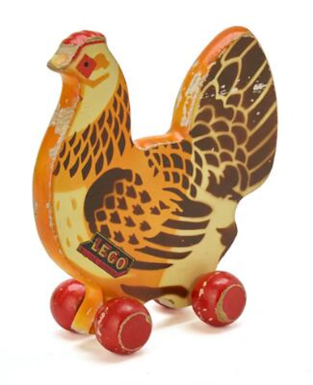 LEGO: Hen in painted wood, mounted on wheels. Manufactured by Lego