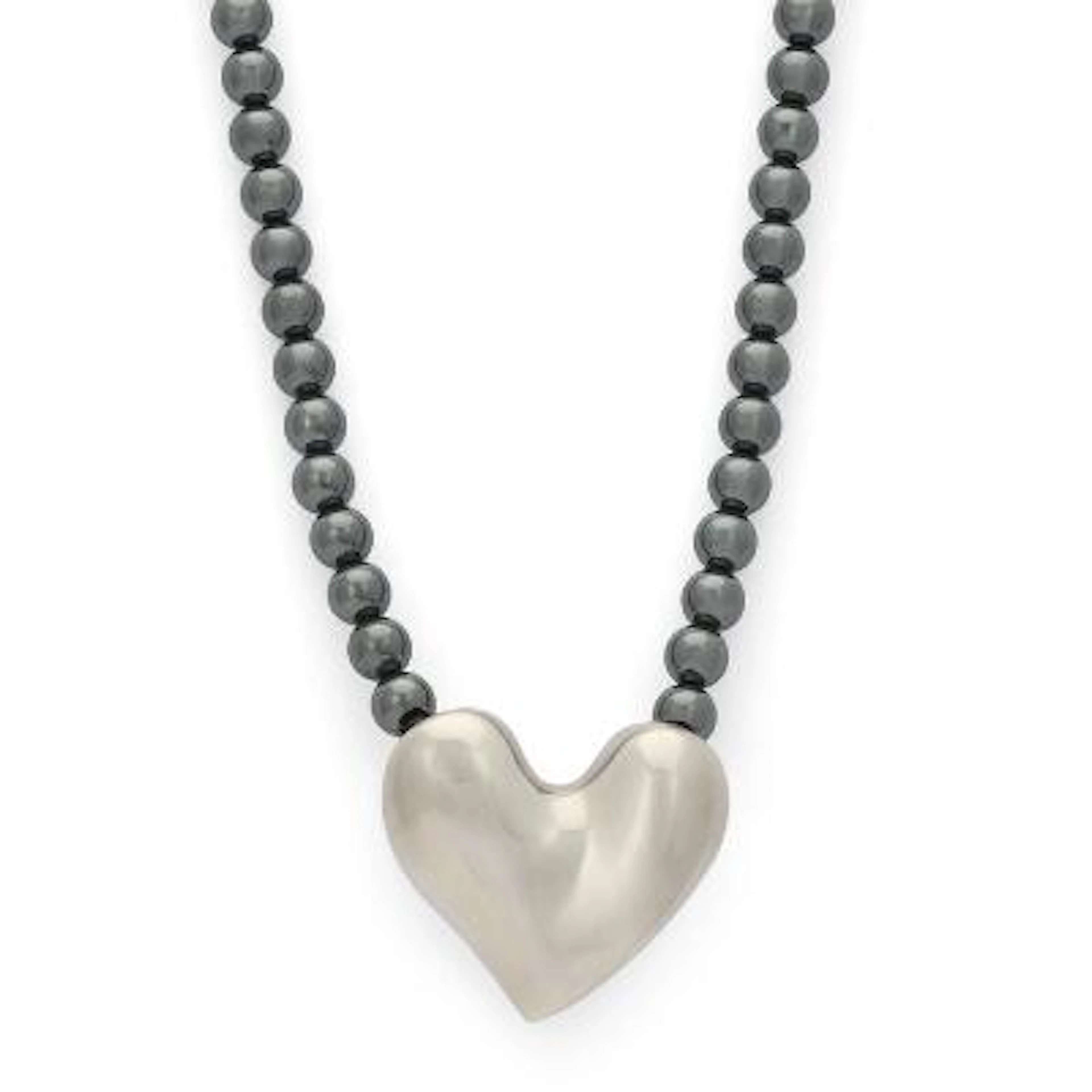 Allan Scharff: A heart-shaped pendant of sterling silver. Accompanied