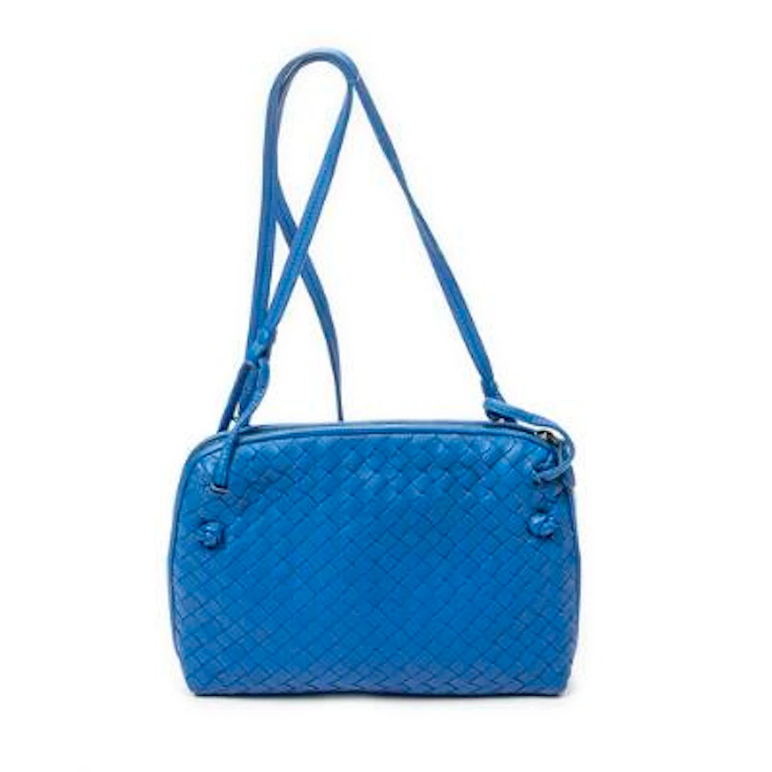 Bottega Veneta: A "Nodini Crossbody" bag of blue Intrecciato-leather
