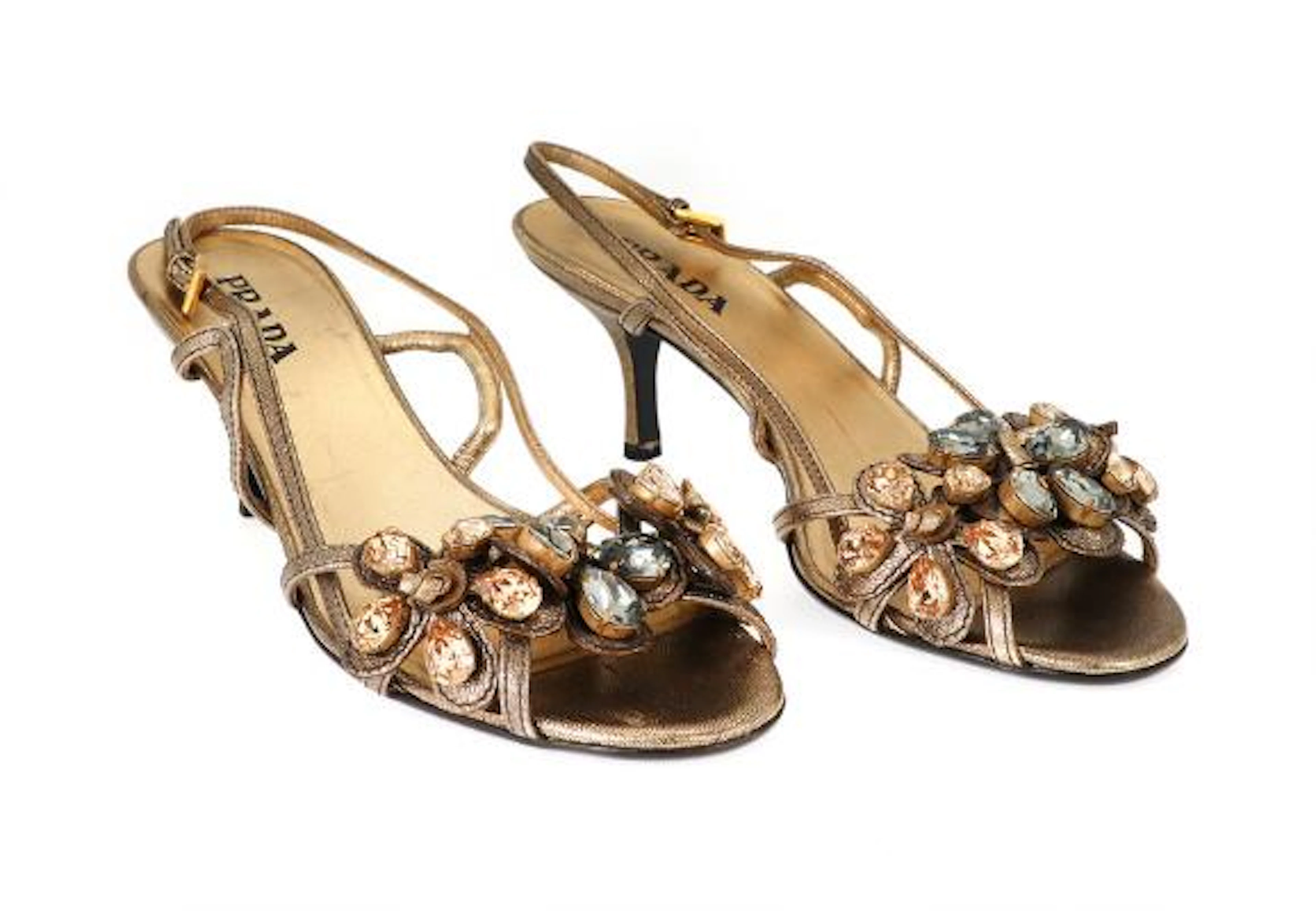 Prada: A pair of stilettos of golden leather embellished with numerous