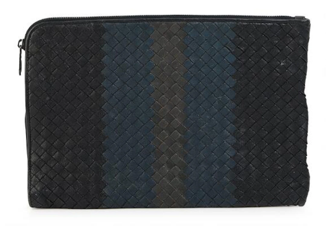 Bottega Veneta: A clutch of dark blue and black woven leather with