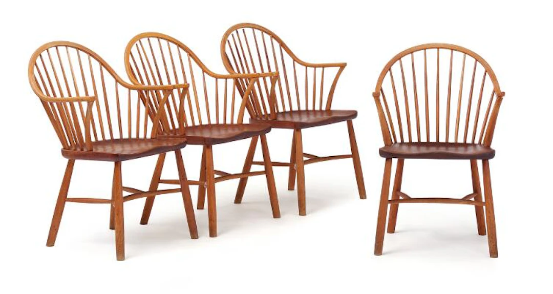 Palle Suenson: Set of four armchairs with beech frame and teak seat.